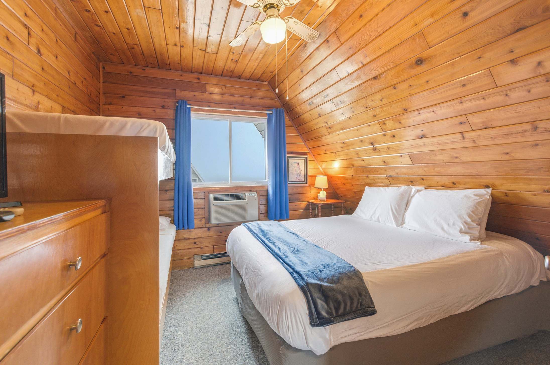 Bedroom 1 is on the 2nd floor and has a queen and a single bunk bed.