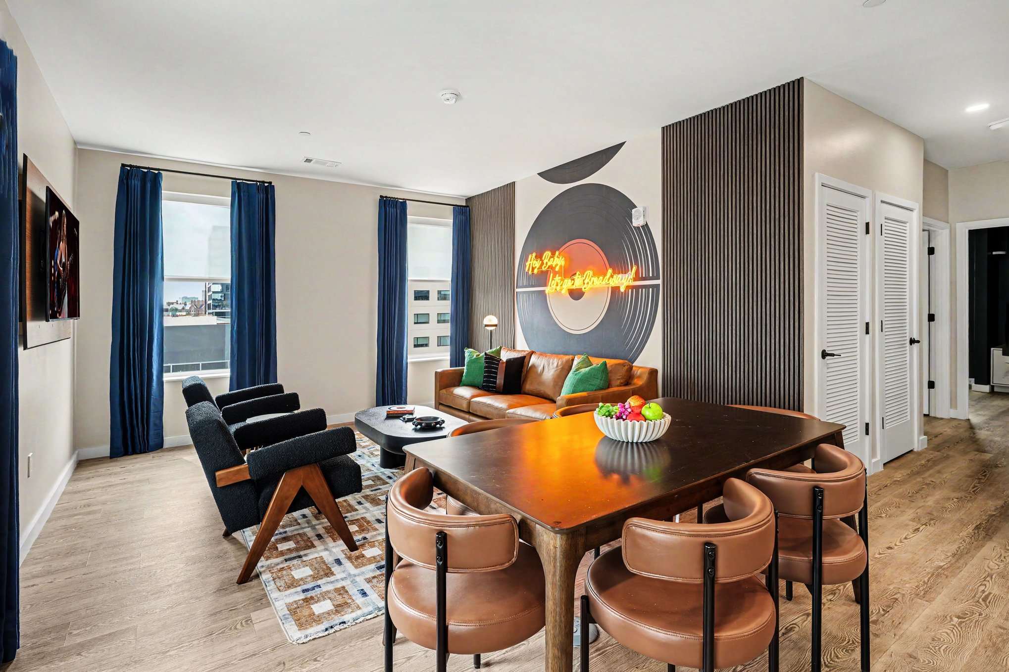 This modern kitchen features sleek stainless steel appliances, dining area for 6, and all the essentials you need for a comfortable and convenient stay. Open concept to living area.