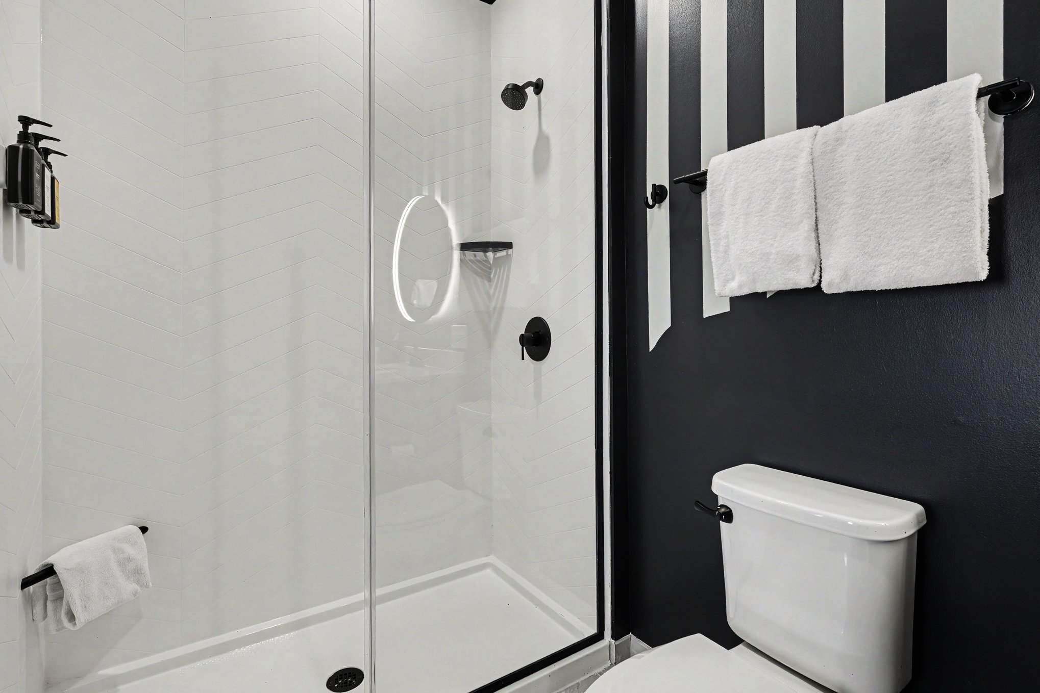 Primary Bathroom featuring a single vanity and a stand-in shower.