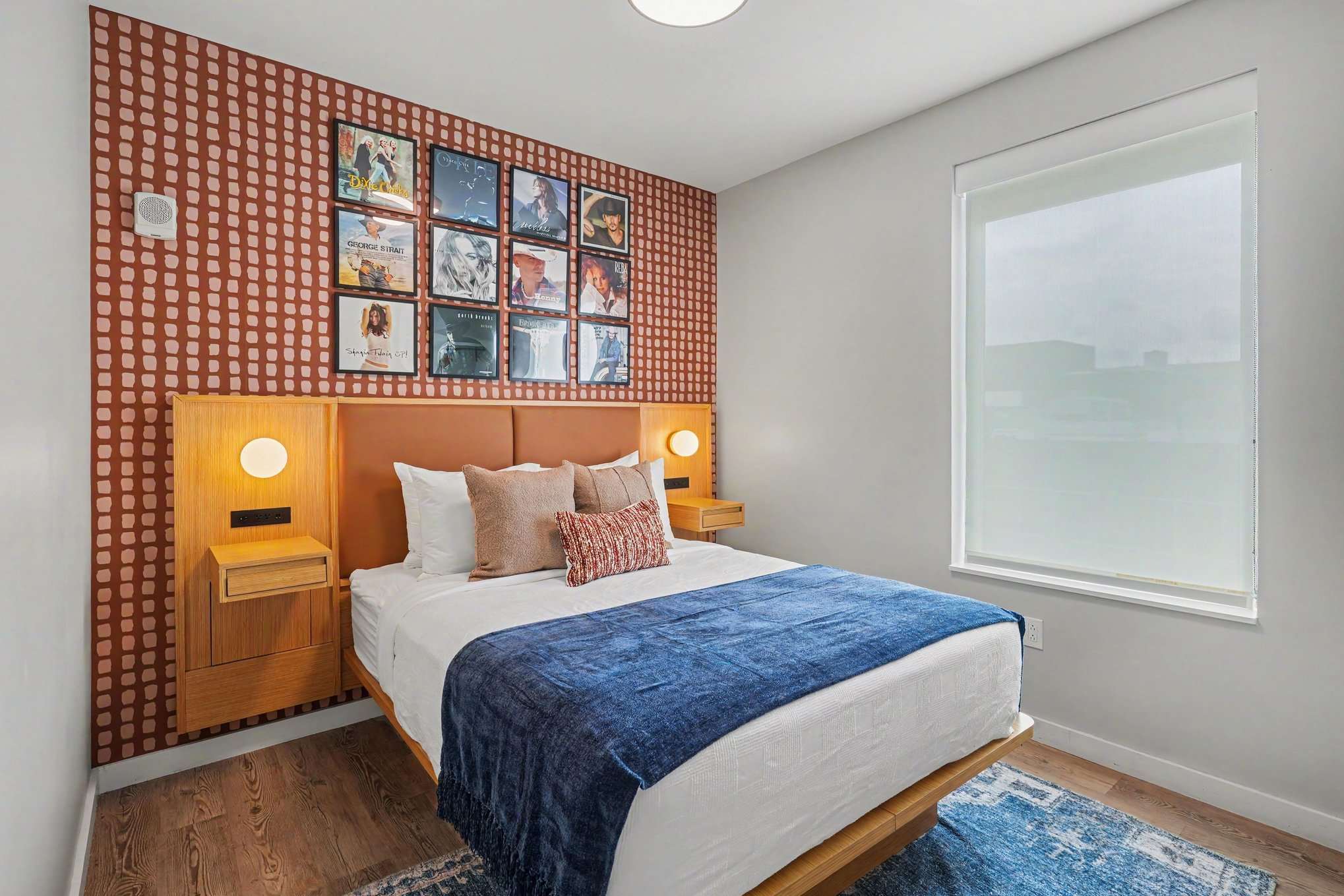 2nd Bedroom featuring a Queen bed, smart TV, and closet space