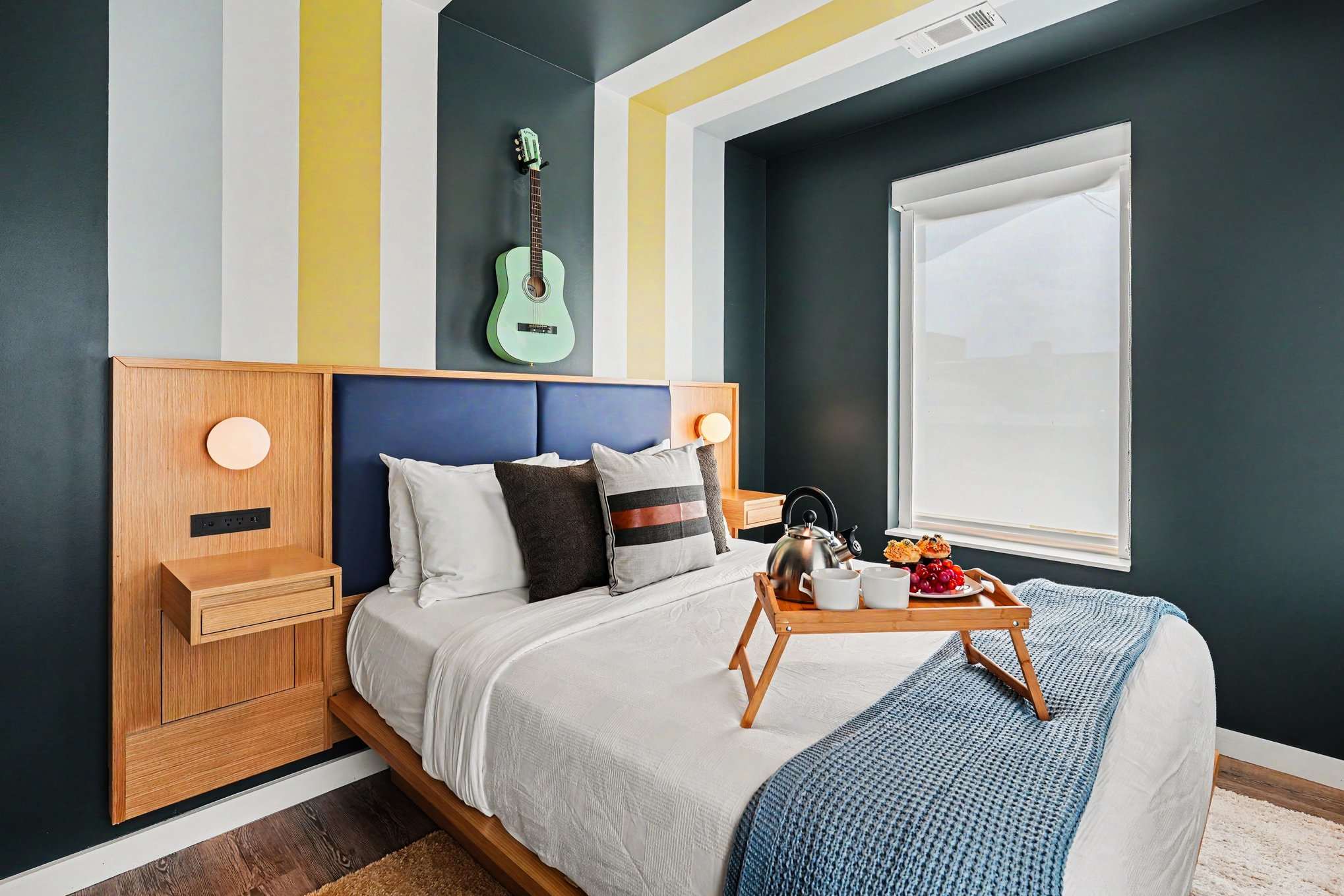 Primary Bedroom featuring a Queen bed, smart TV, closet space, and an en-suite bathroom.