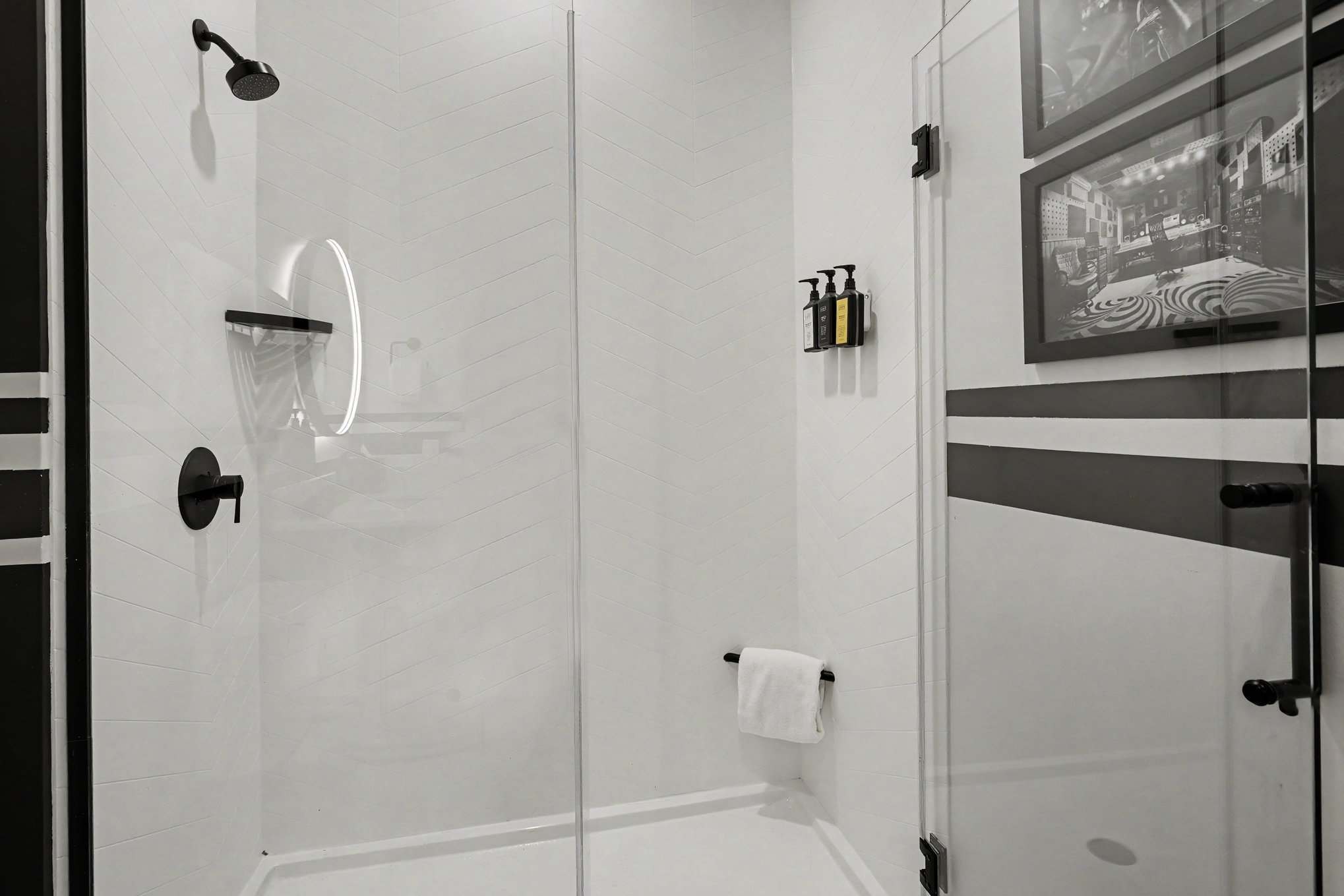 2nd Bathroom with a single vanity and a stand-in shower.