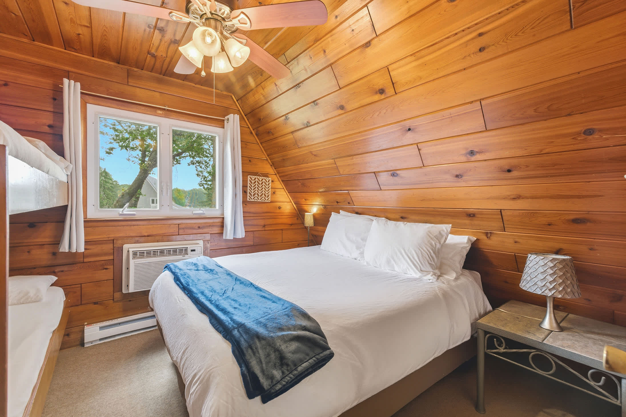 Bedroom 1 is on the 2nd floor and has a queen and single bunk bed.