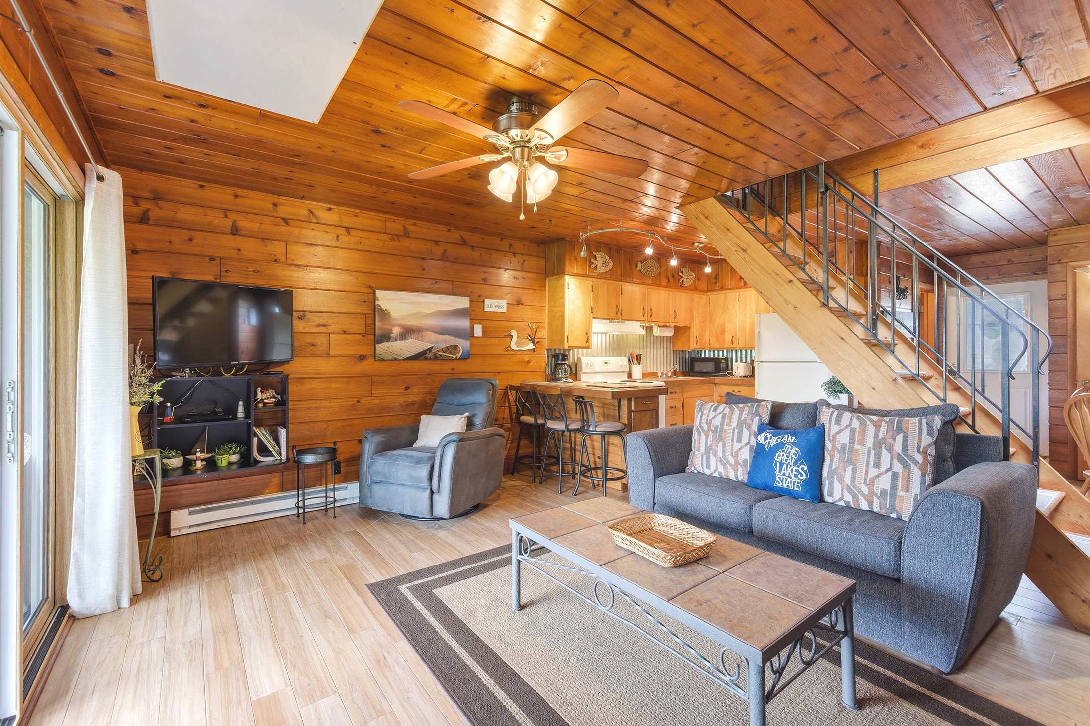 Open layout combines dining, cooking, and relaxing in one space.