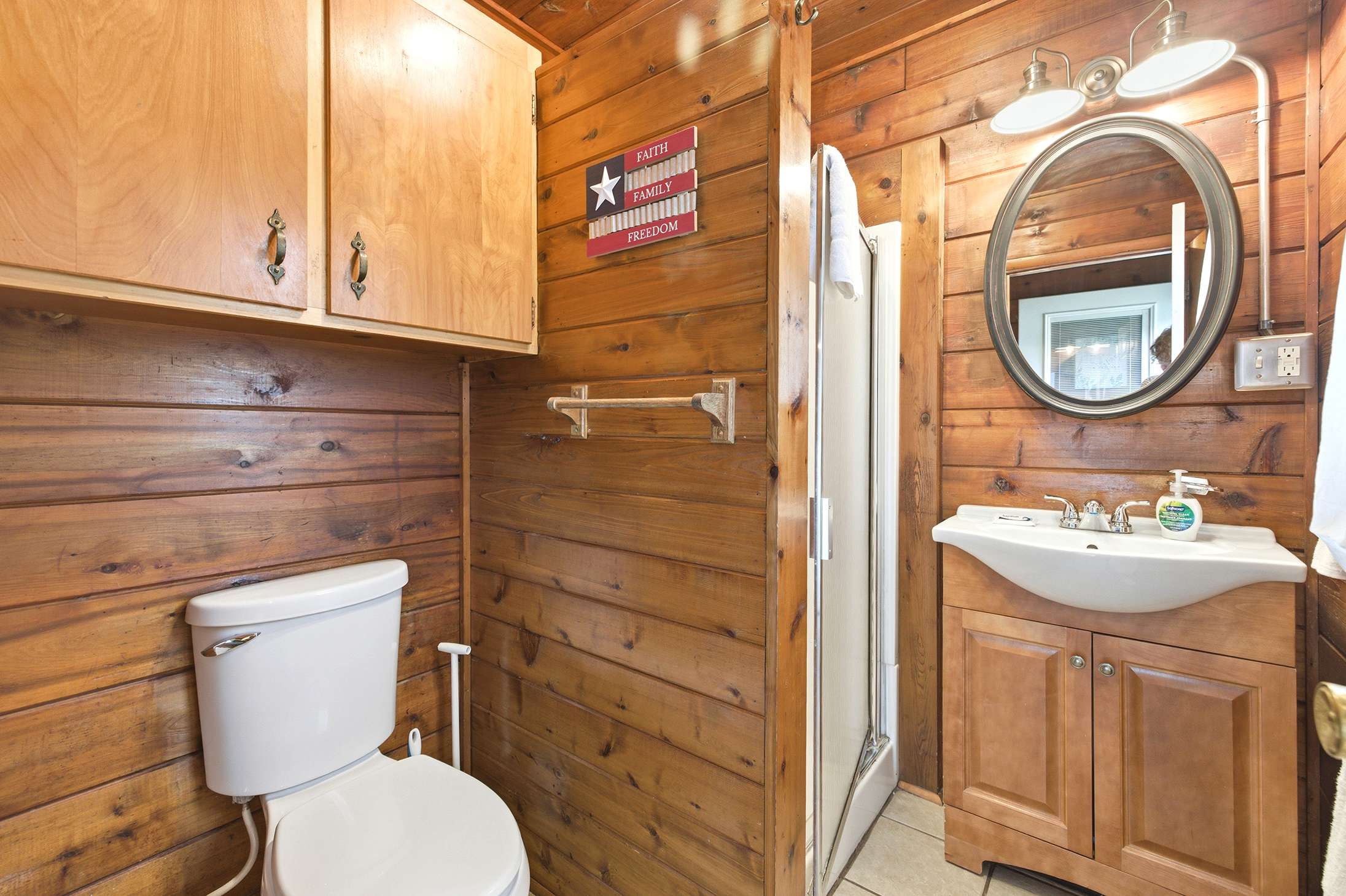 Main level bathroom keeps daily routines simple for families.