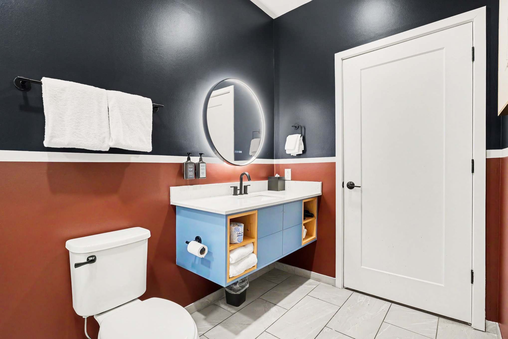2nd Bathroom is a Jack-n-Jill featuring a single vanity and a stand-in shower.