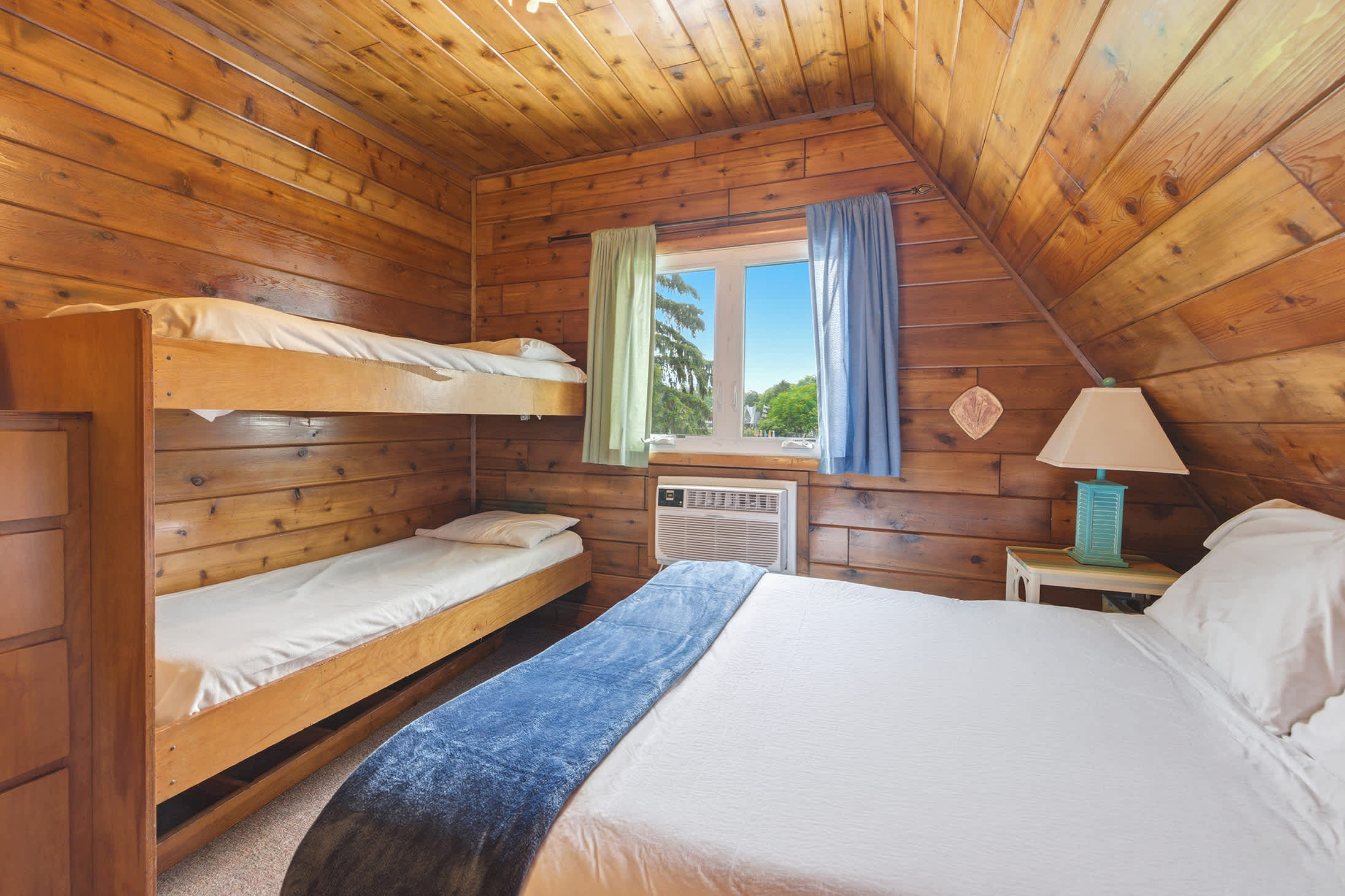 Bedroom 1 is on the 2nd floor and has a queen and single bunk bed.