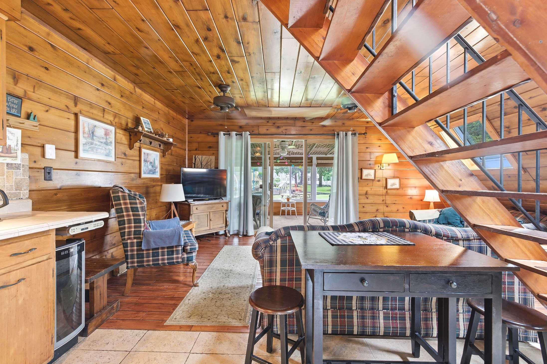 Open layout keeps the kitchen, dining, and living areas connected.
