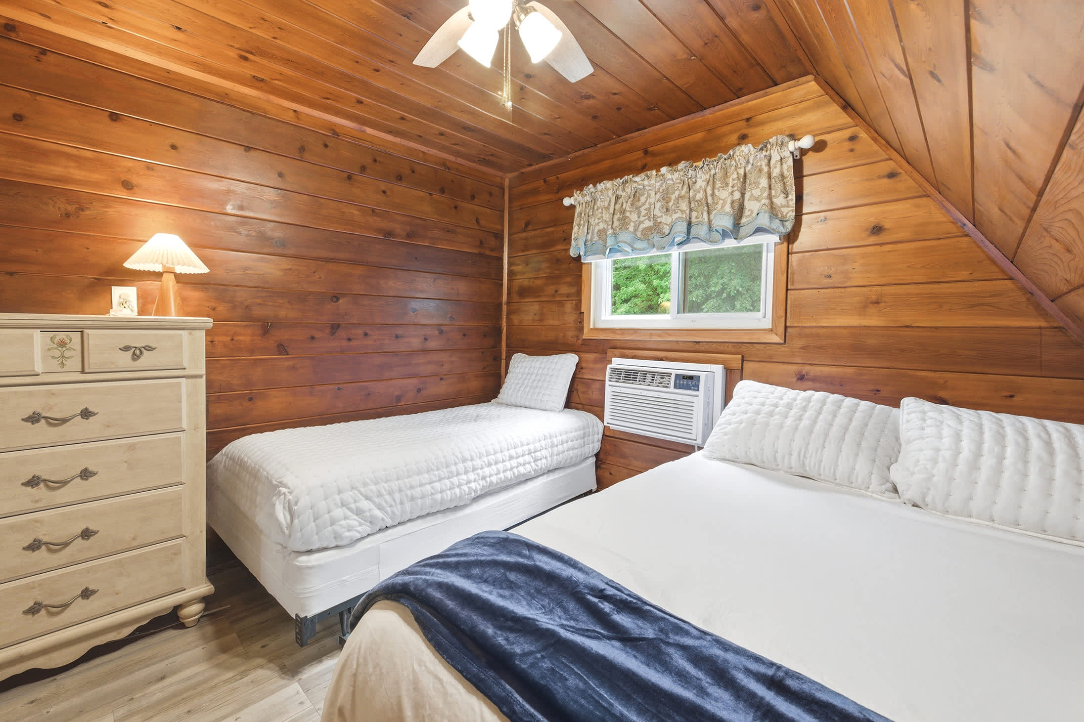 Bedroom 2 is on the 2nd floor and has a queen and single bed.