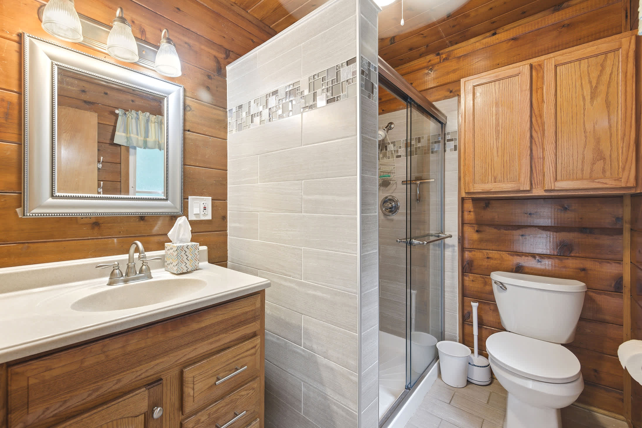Main floor full bathroom with modern updates and easy access from common areas.