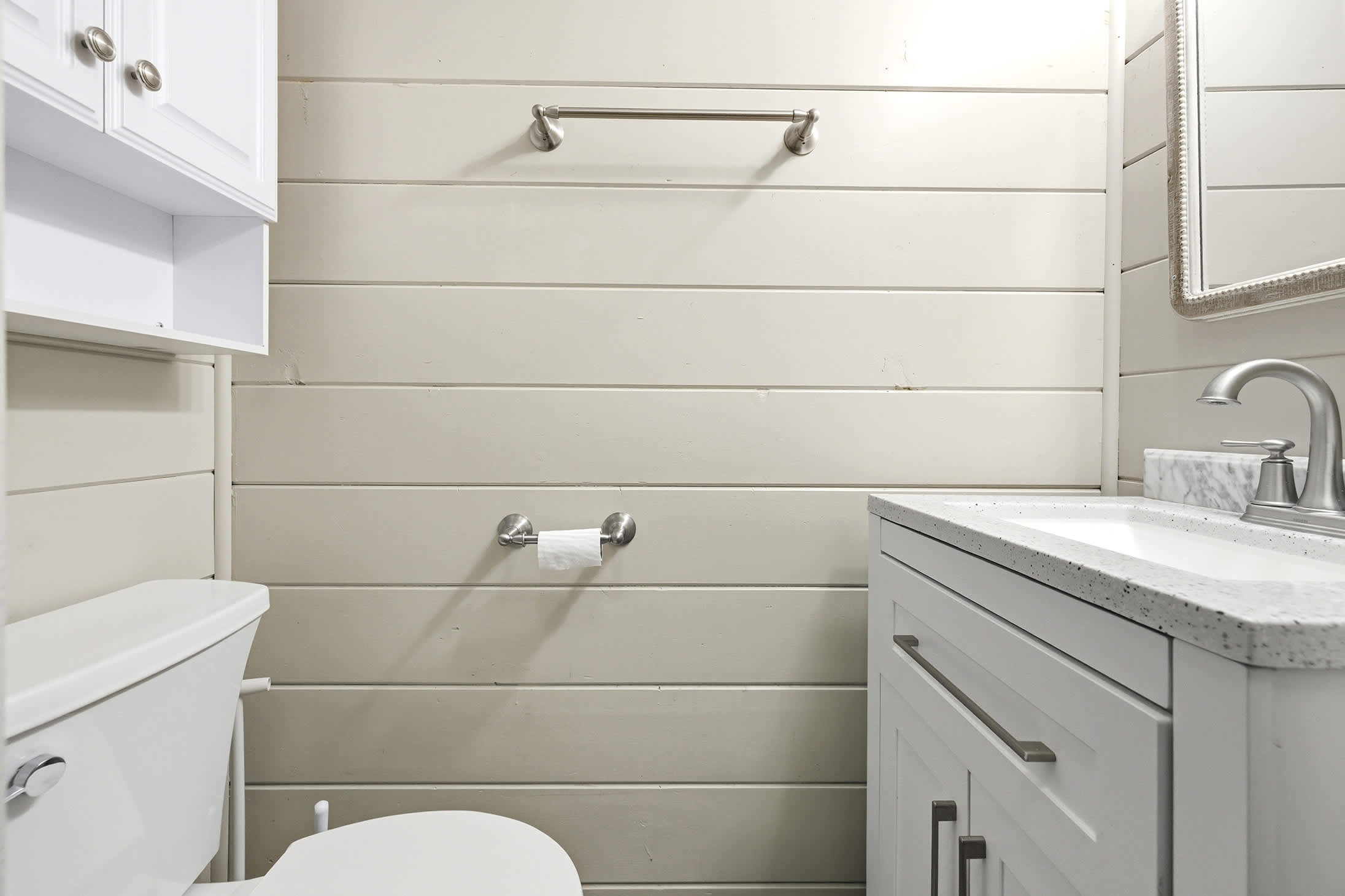 The second-floor half bath adds convenience near the home's sleeping areas.