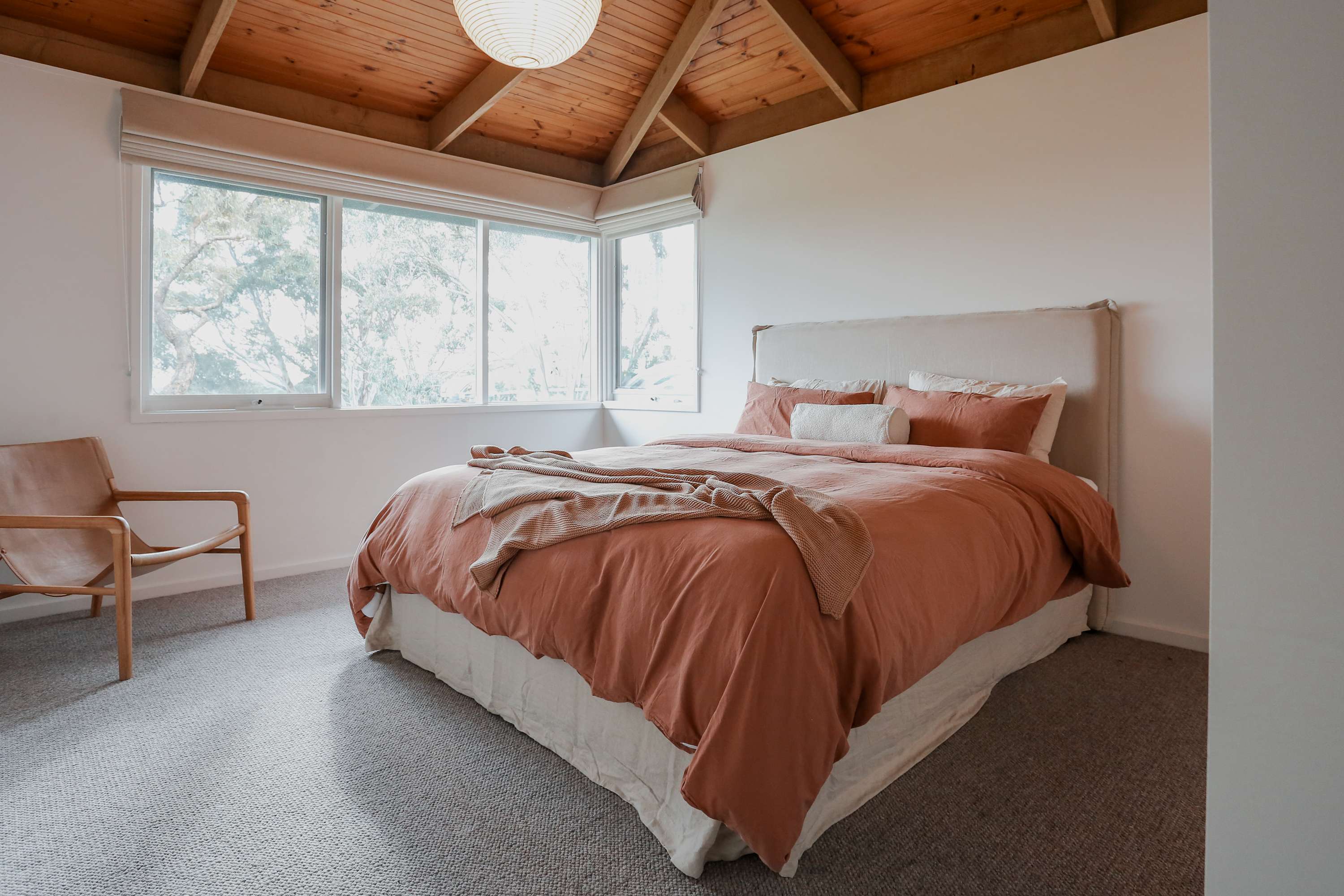 Wake beneath the rafters to birdsong and open skies.