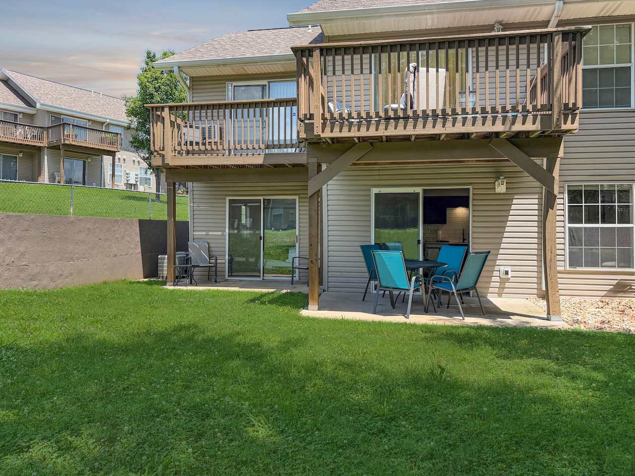 Two patios and even some grass make for a beautiful time relaxing outside.