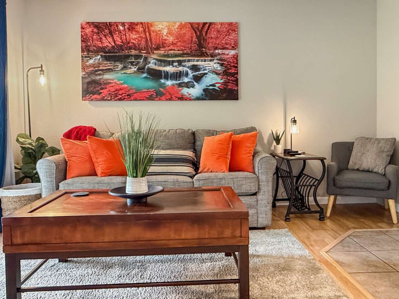 Comfy living room decorated in beautiful and tasteful colors in a a Water theme.