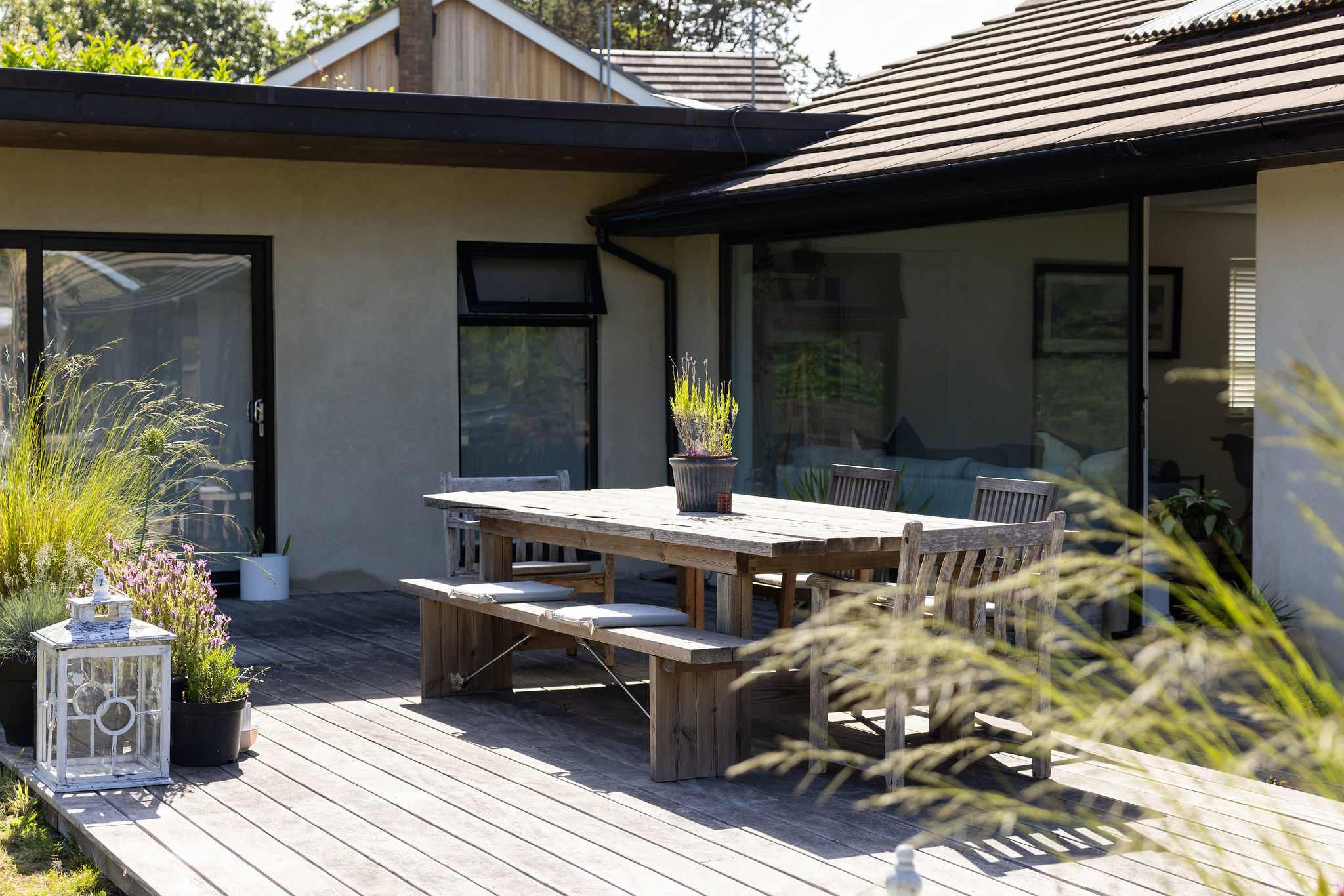A sunny deck made for outdoor dining and lazy afternoons