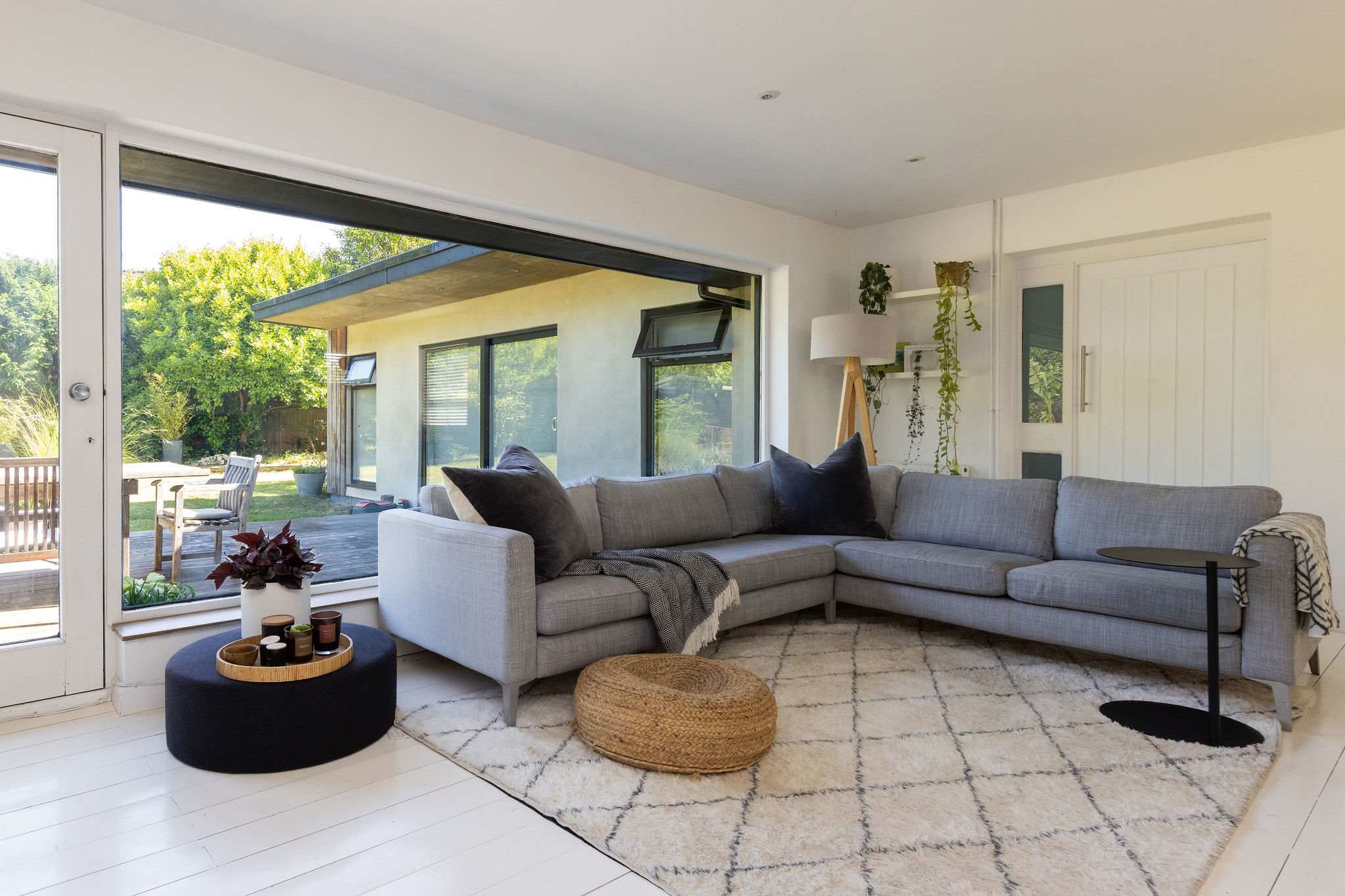 Sink into the sofa and enjoy garden views from the lounge