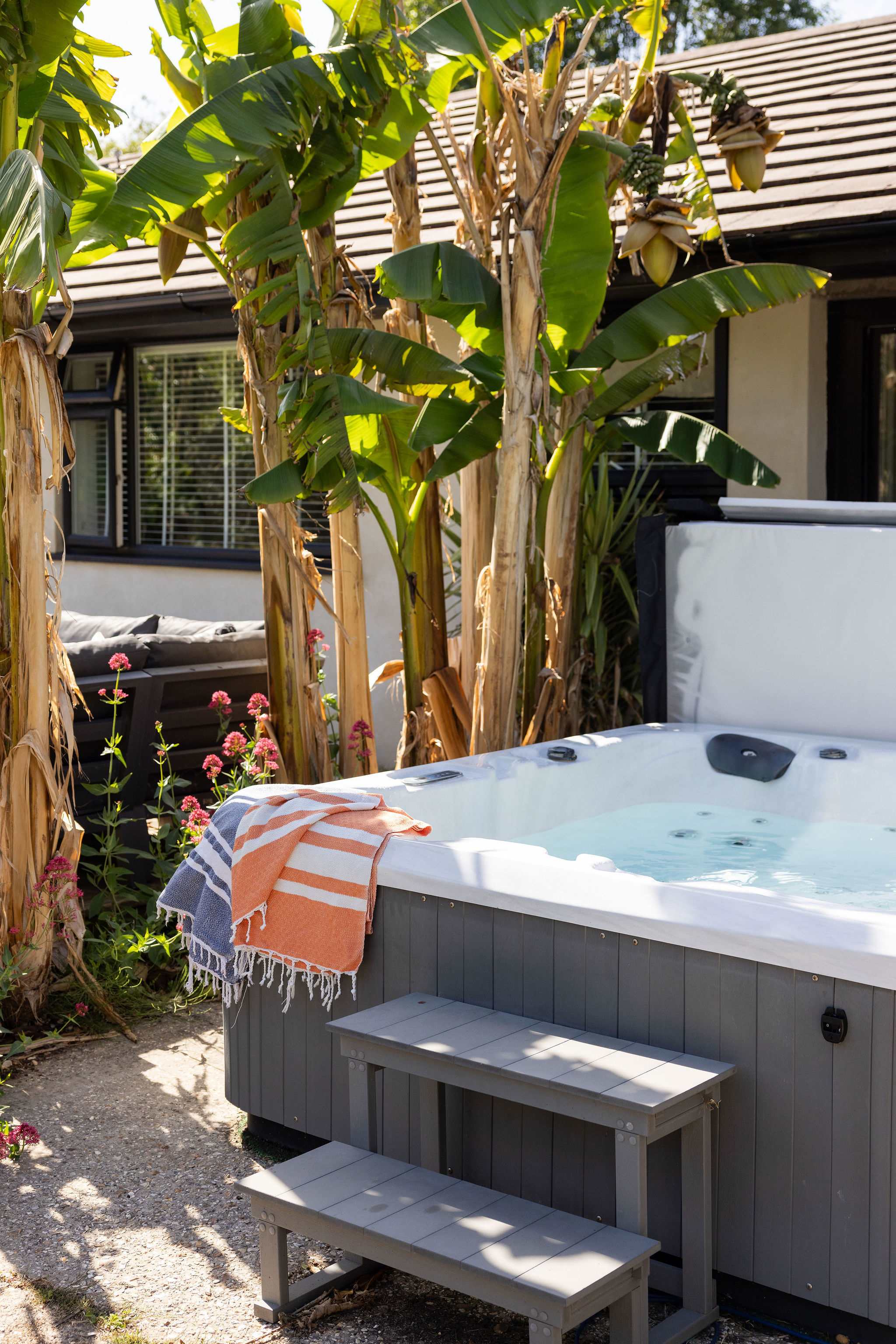 Slip into the hot tub after a day exploring the coast