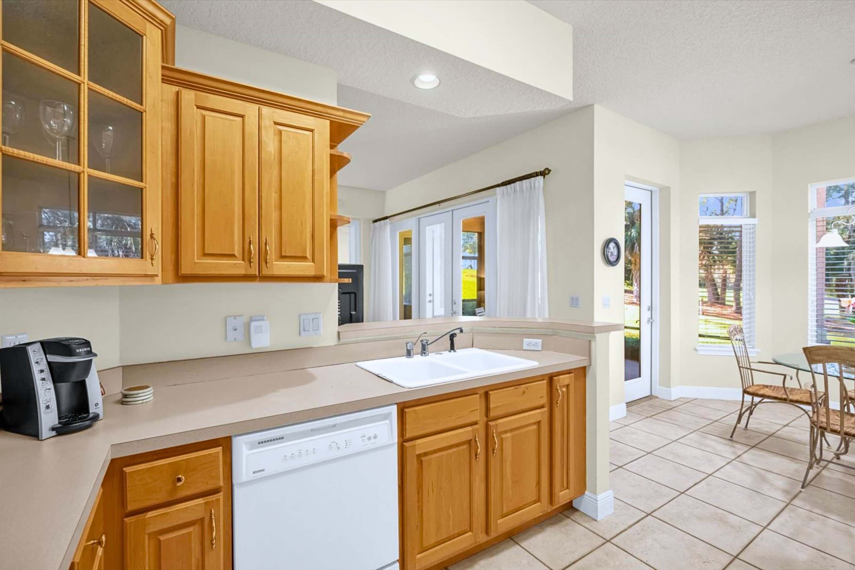 Seamless access to kitchen and dining with seating for four