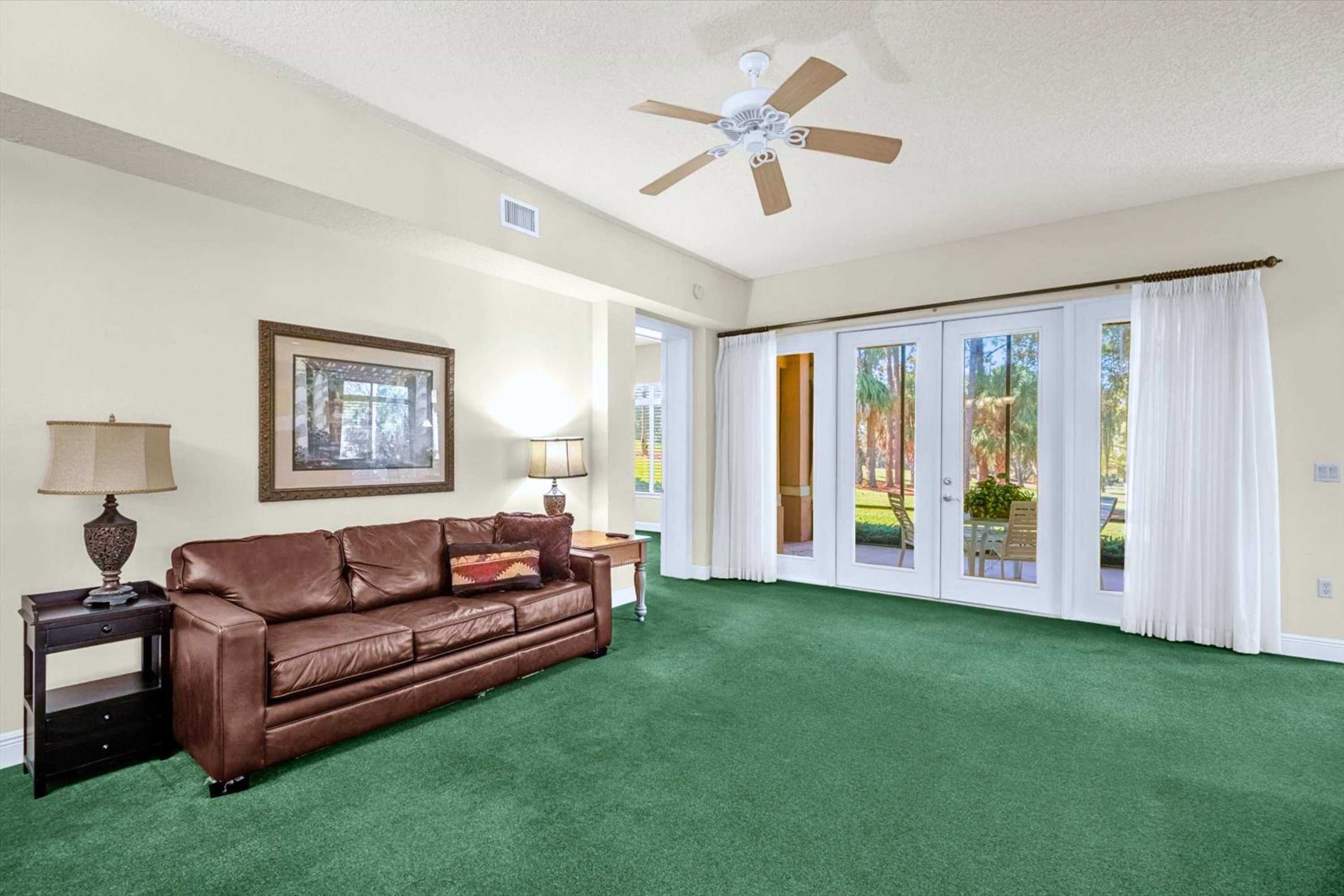 Open and inviting living room with a cozy lounge area, perfect for relaxing, watching TV, and unwinding after a day out