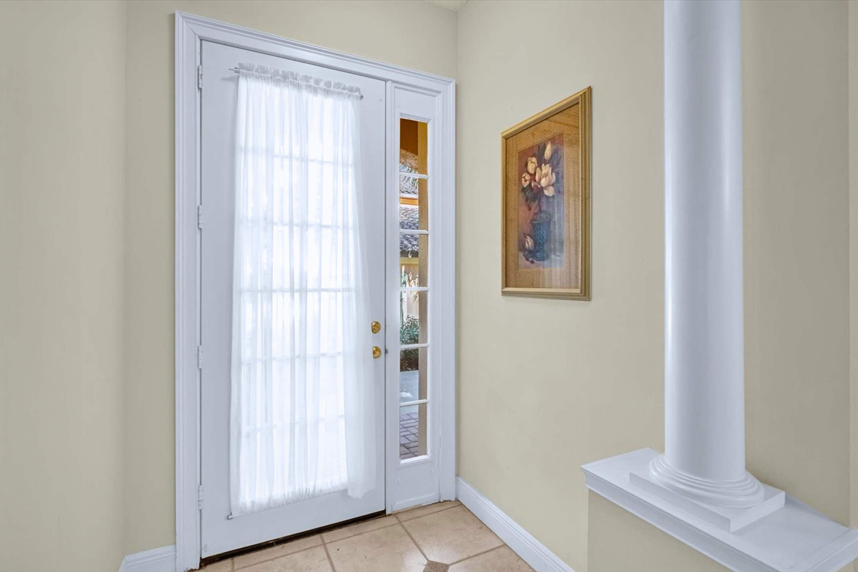 Glass entry door with curtains for privacy