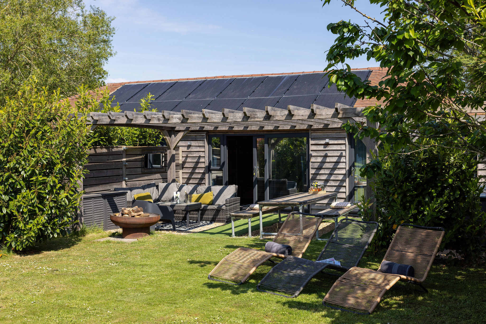 Soak up the sun and enjoy tranquil rural views from this beautifully landscaped outdoor oasis.