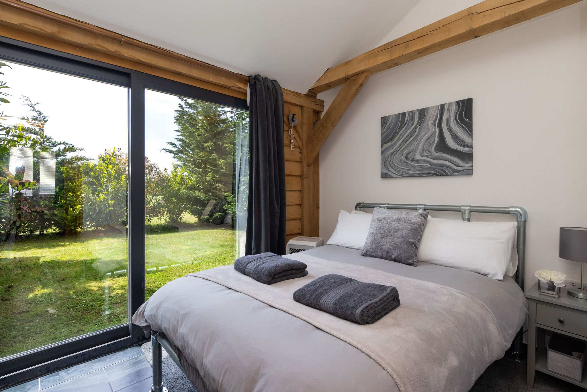 Wake up to breathtaking countryside views in this beautifully bright double bedroom.