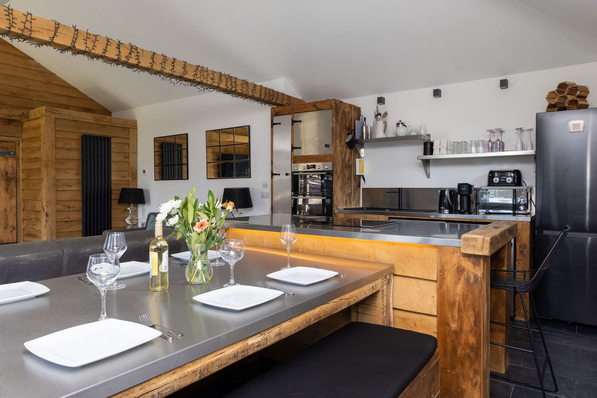 Entertain easily in this striking, fully-equipped modern kitchen and inviting dining area.