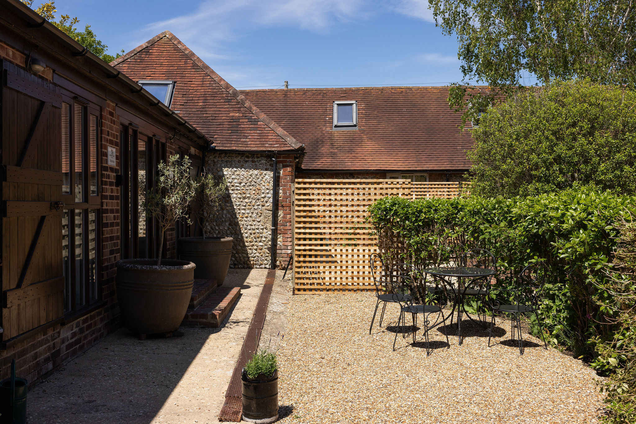 There is a pretty, shared courtyard area with seating (shared with another ensuite room) to enjoy a morning coffee or evening drink.