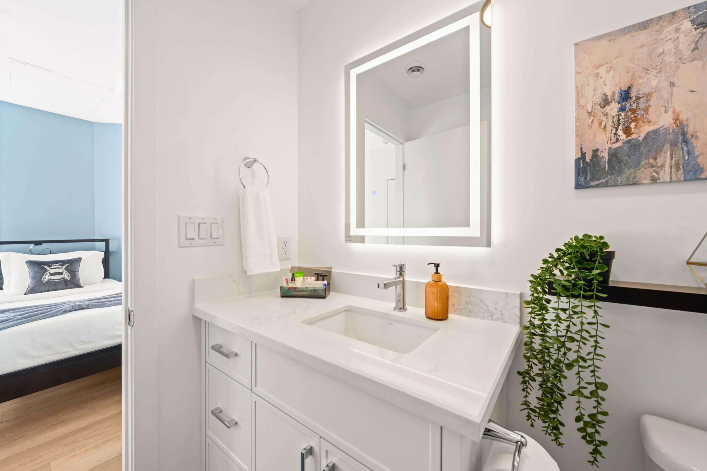 Modern vanity with LED mirror.