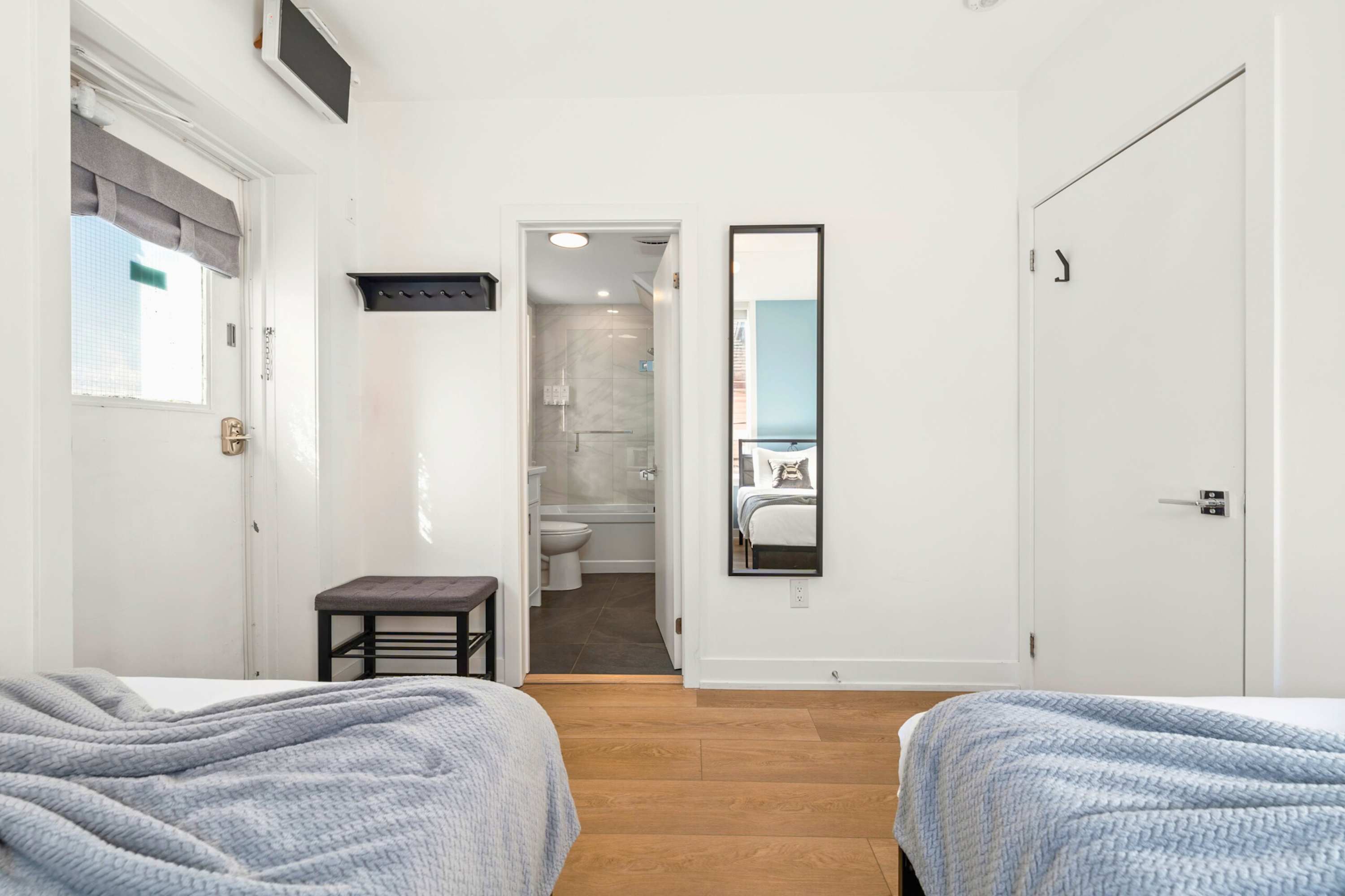 Spacious twin bedroom with bathroom.
