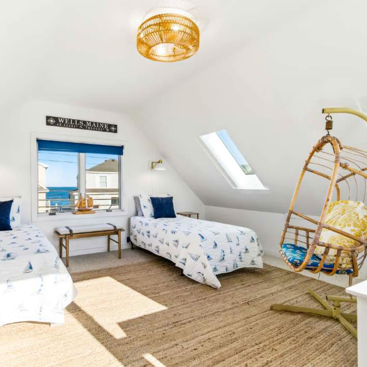 The loft is ideal for an afternoon snooze, offering a pair of twin beds & a cozy egg chair​
