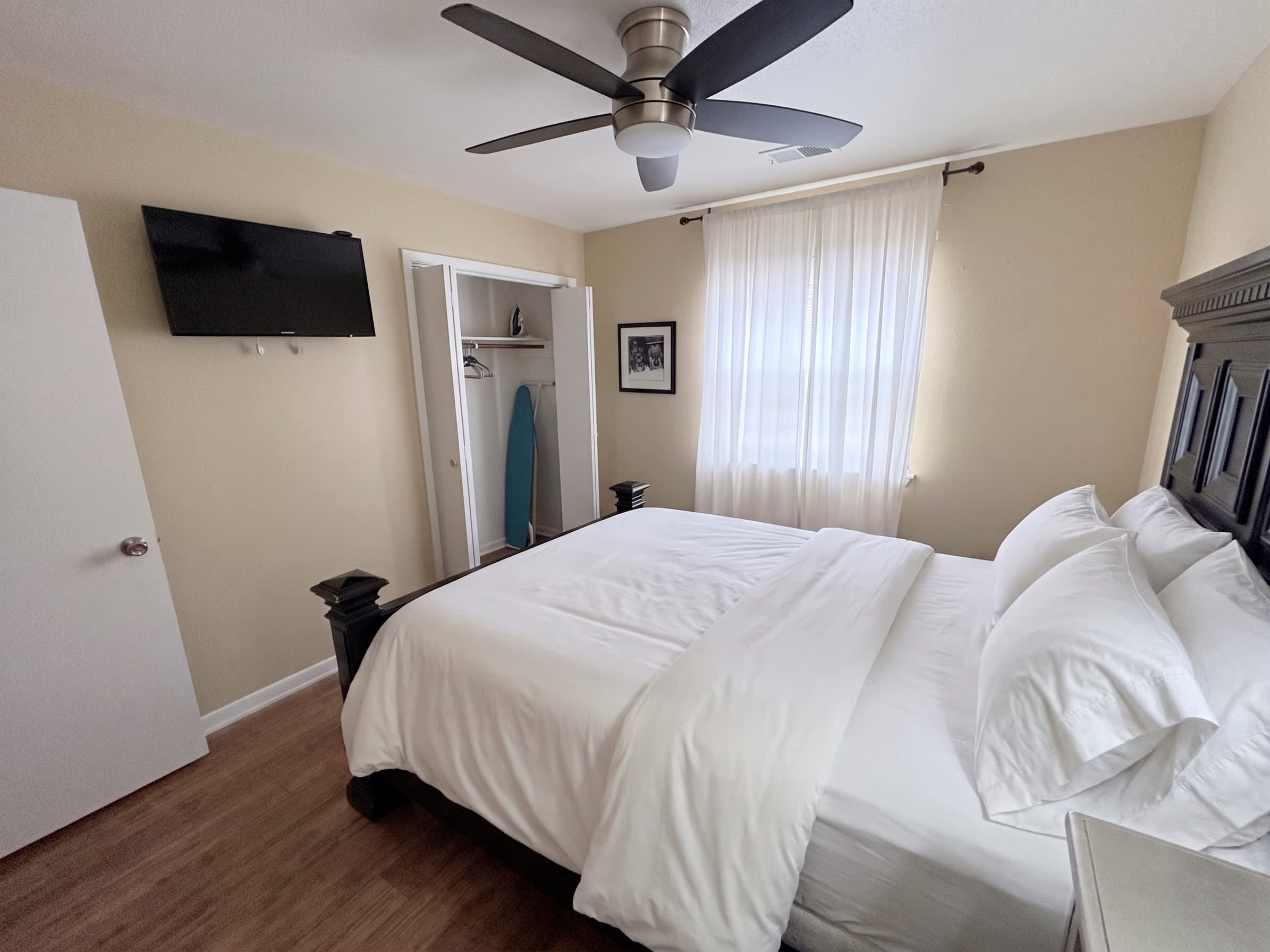 Enjoy a peaceful night's rest in this bright and welcoming bedroom
