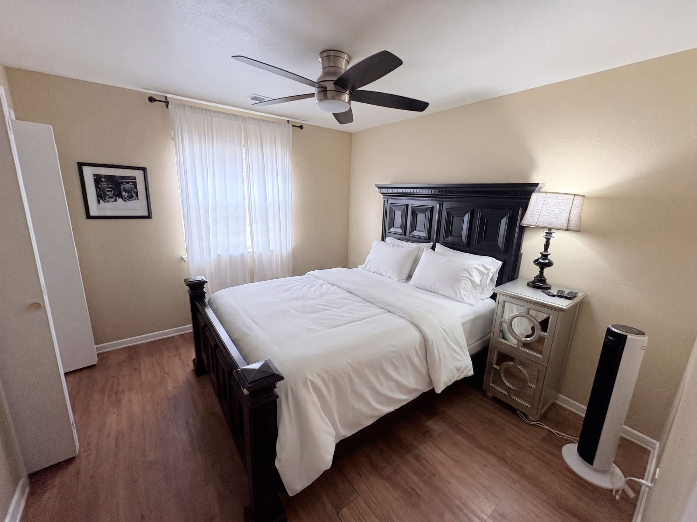Unwind in a cozy and beautifully appointed bedroom designed for comfort