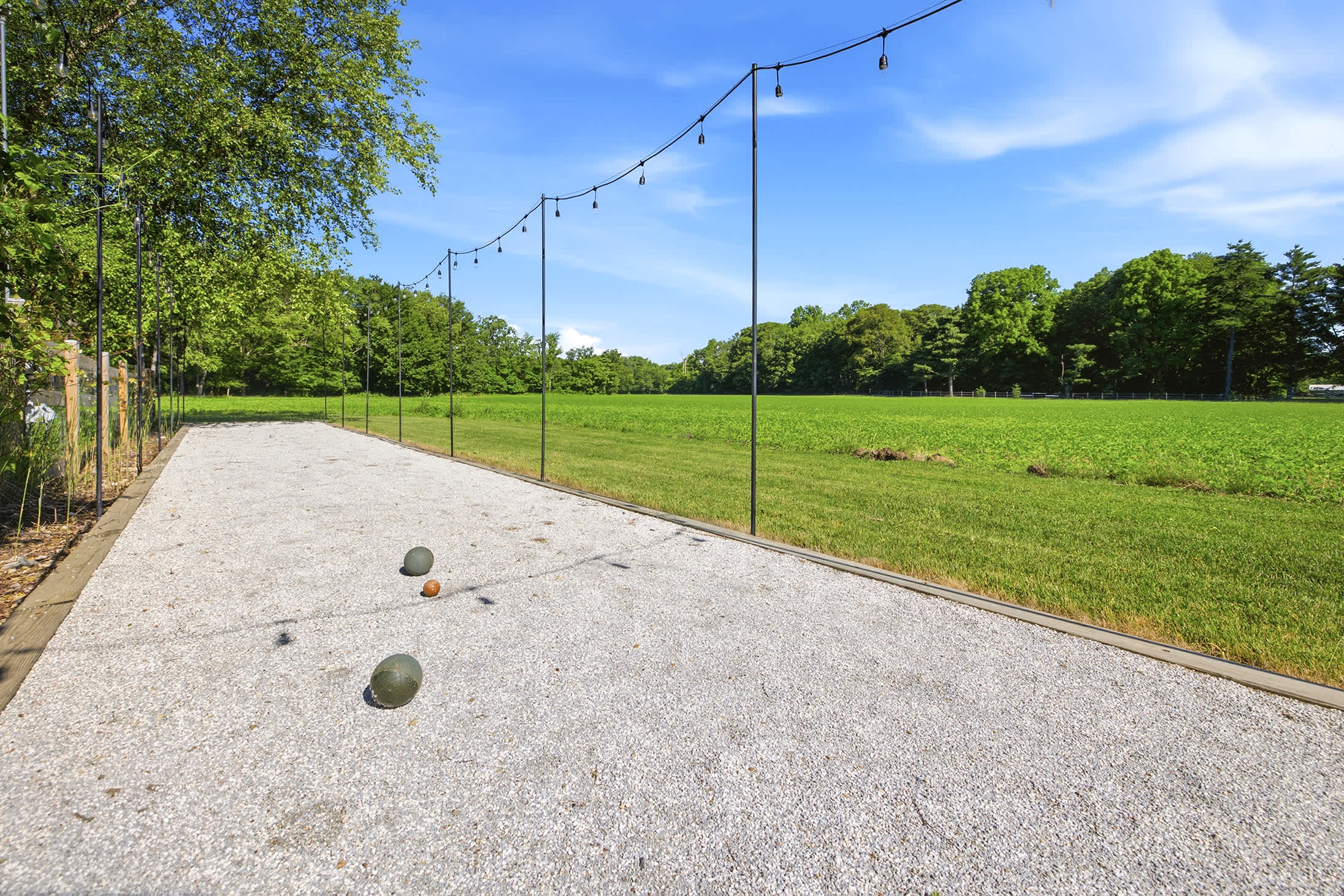 Bocce fun framed by the fields of Berrywood Farm.
