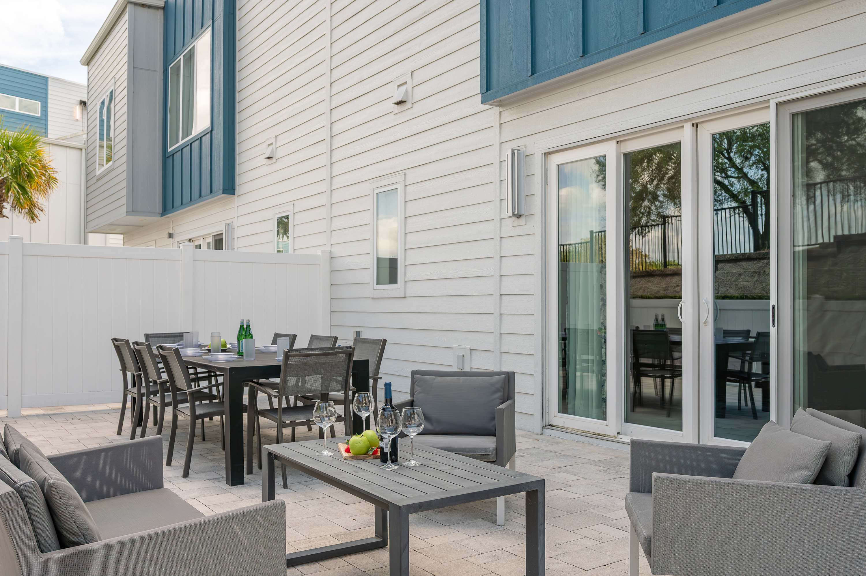 Outdoor patio with dining and lounge seating for relaxing and entertaining.