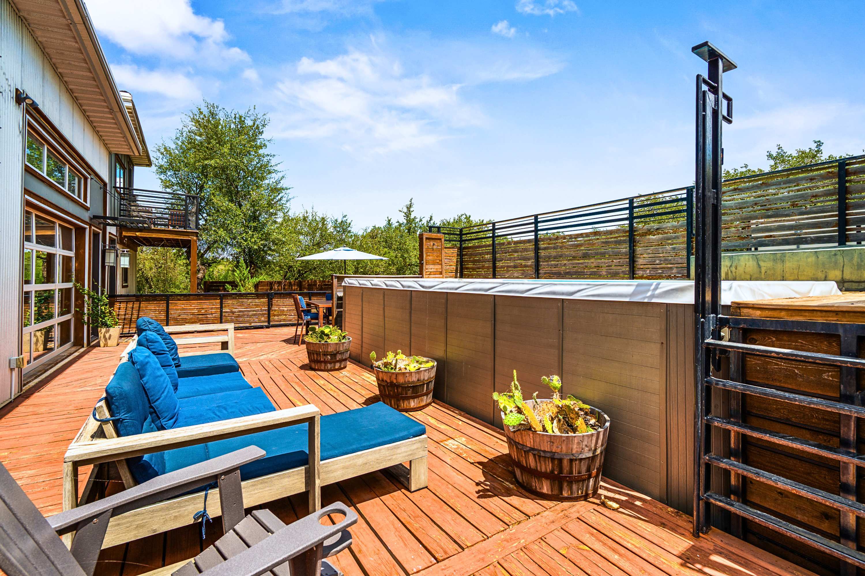 Main: Soak up the sun on premium poolside loungers.
