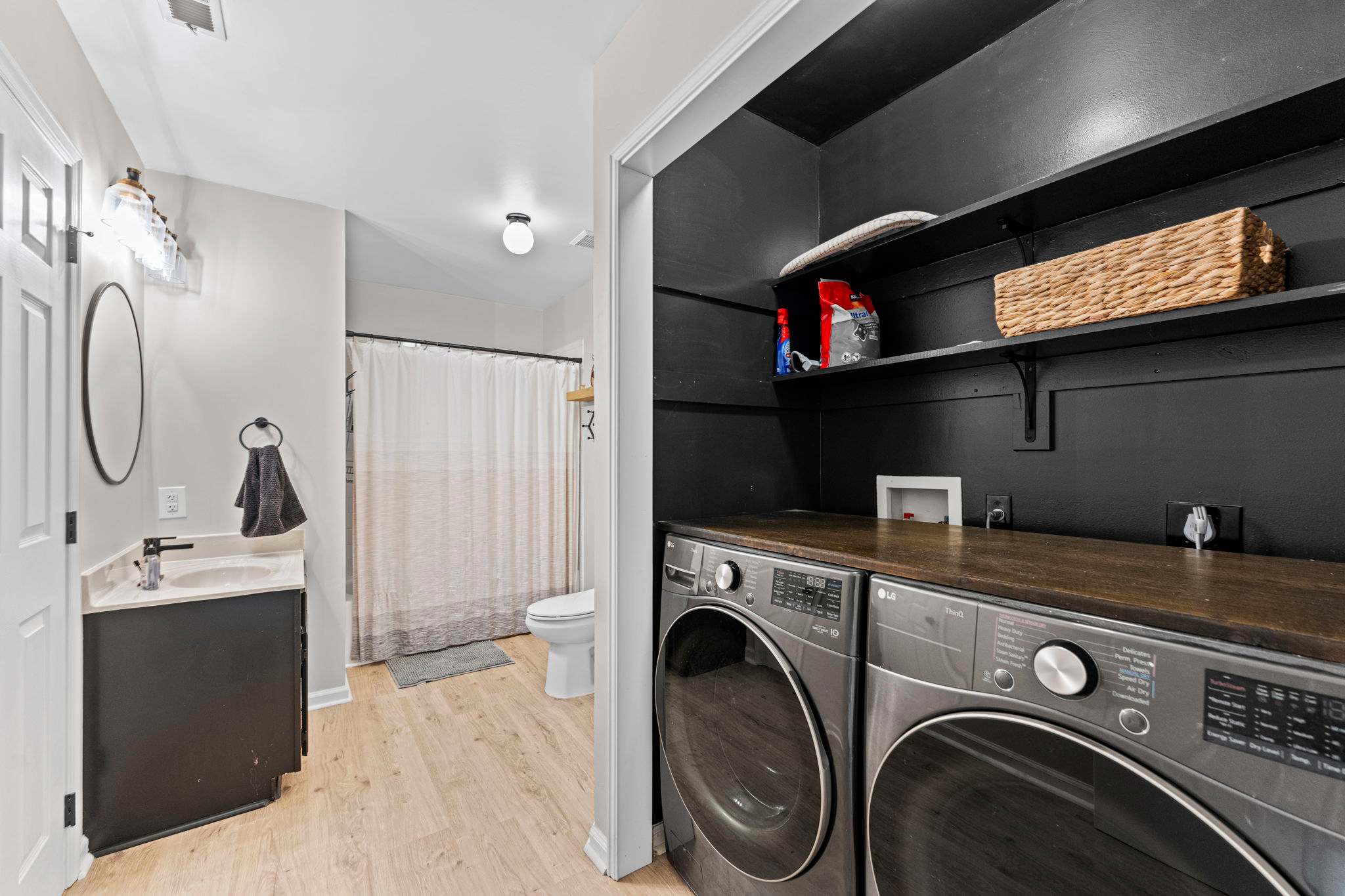 Bathroom 2: Shower/Tub combo attached to Bedroom 2
