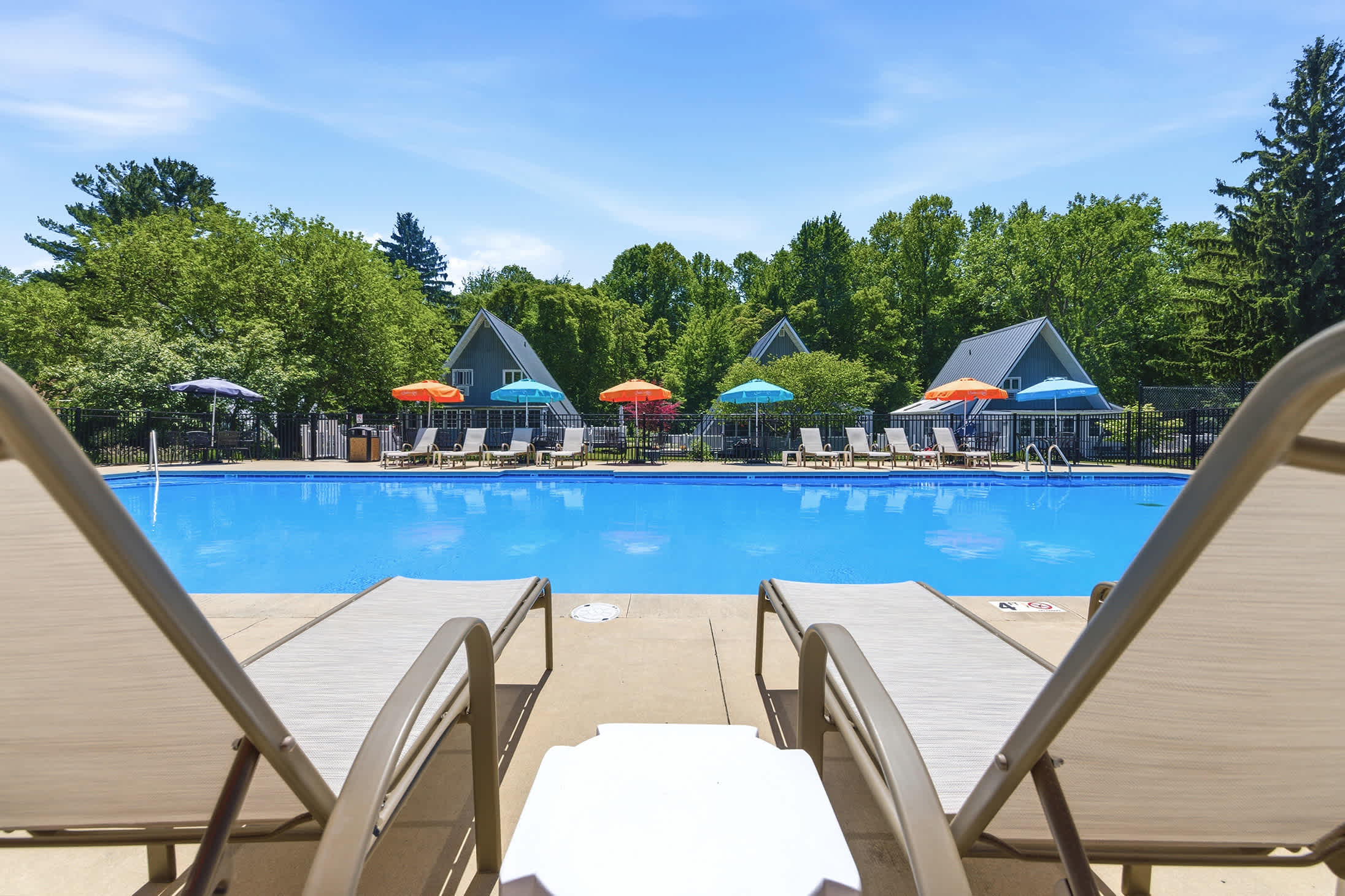 Resort pool with full lounge seating available to all guests.