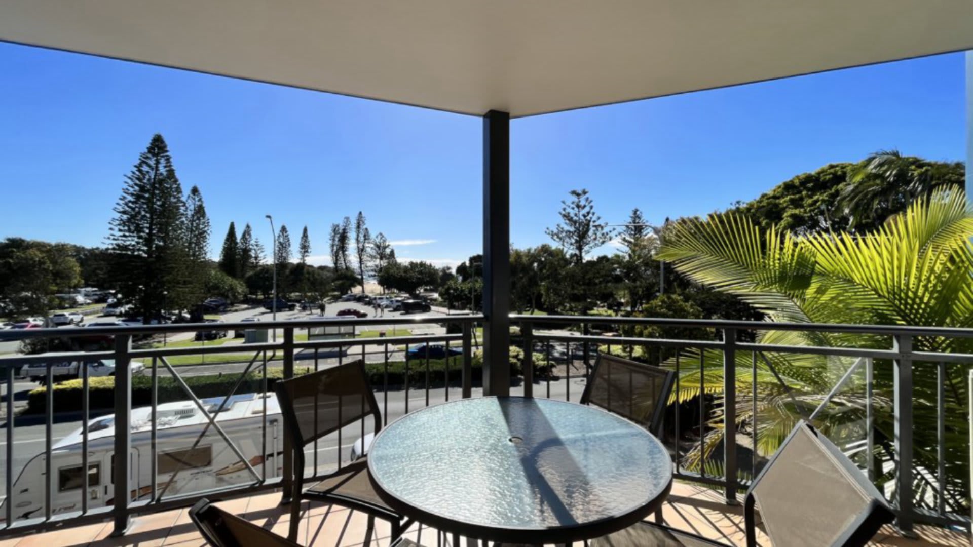 Coastal 2-bedroom apartment at Portobello by the Sea, Dicky Beach. Enjoy ocean glimpses, resort pool, and BBQ area. Sleeps 4 comfortably. Steps from surf, cafes, and shops. Perfect for a relaxing Sunshine Coast holiday.