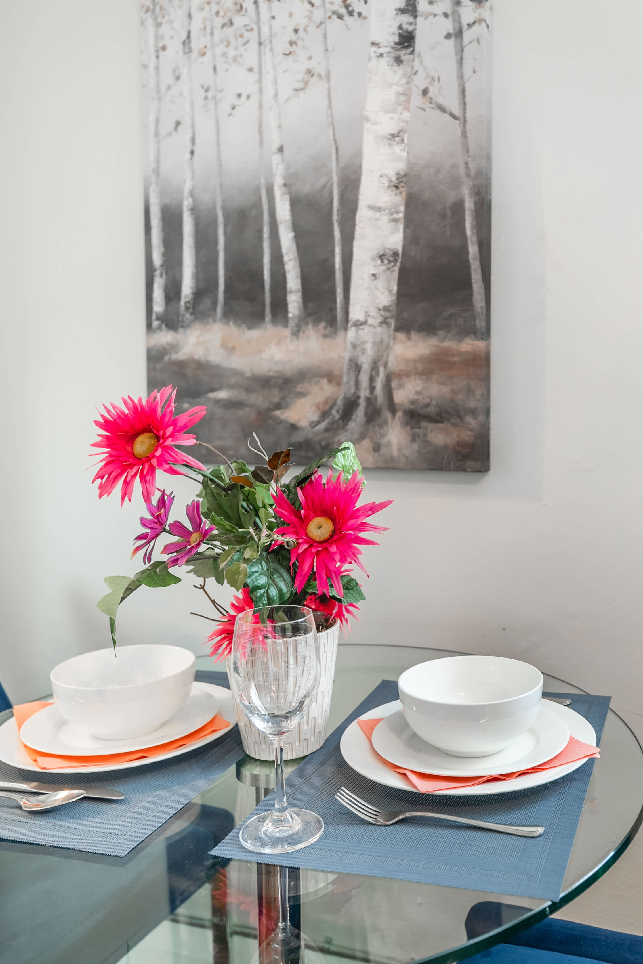 Dining setup with a floral centerpiece