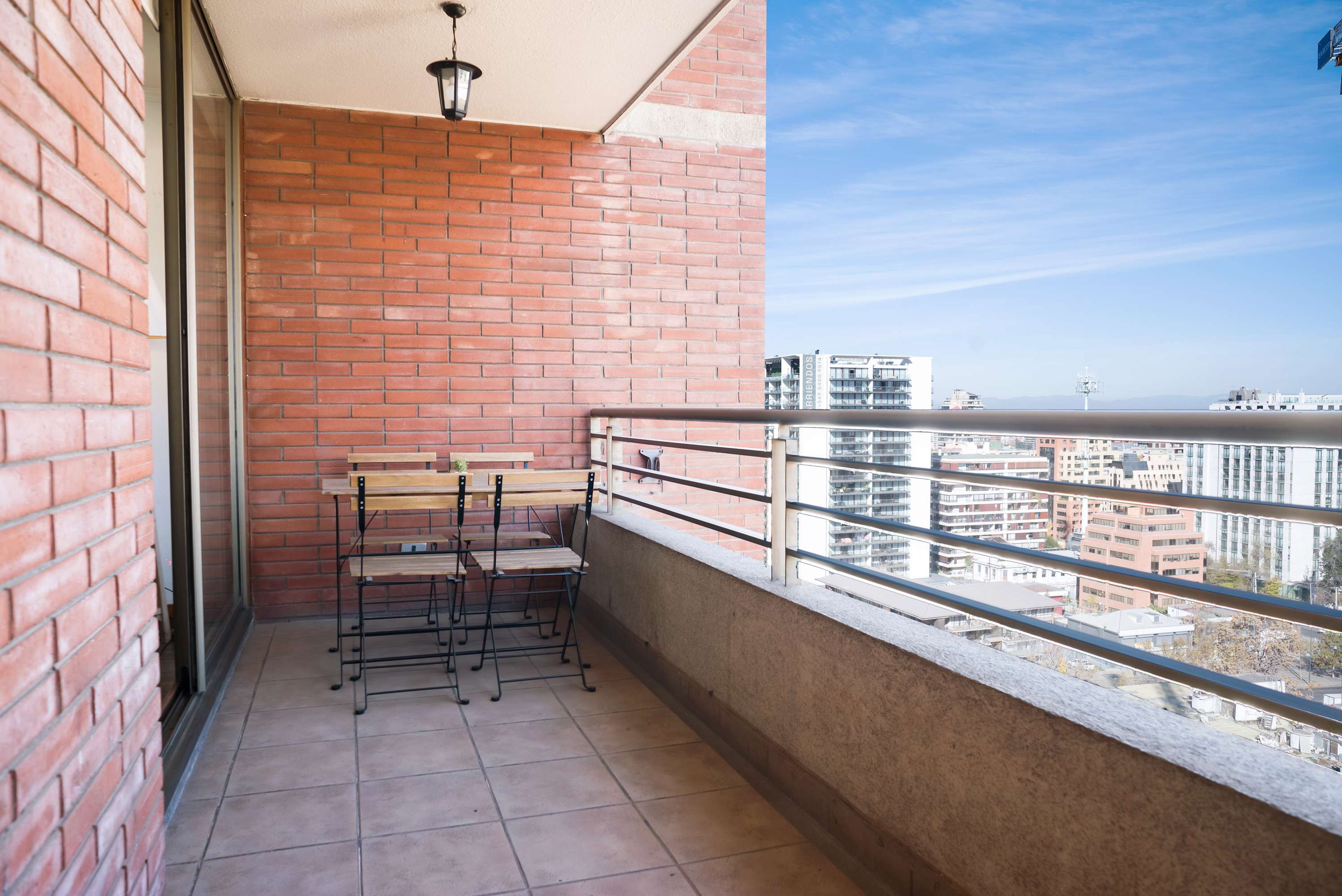 Relax on the private balcony and soak in panoramic city views, perfect for morning coffee or evening relaxation.