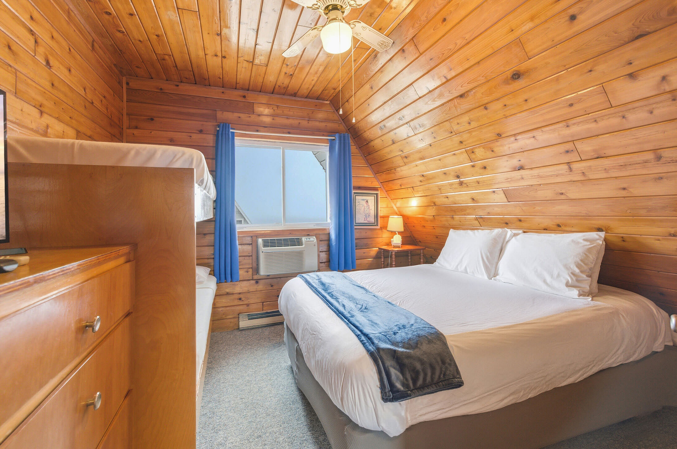 Bedroom 1 is on the 2nd floor and has a queen and a single bunk bed.
