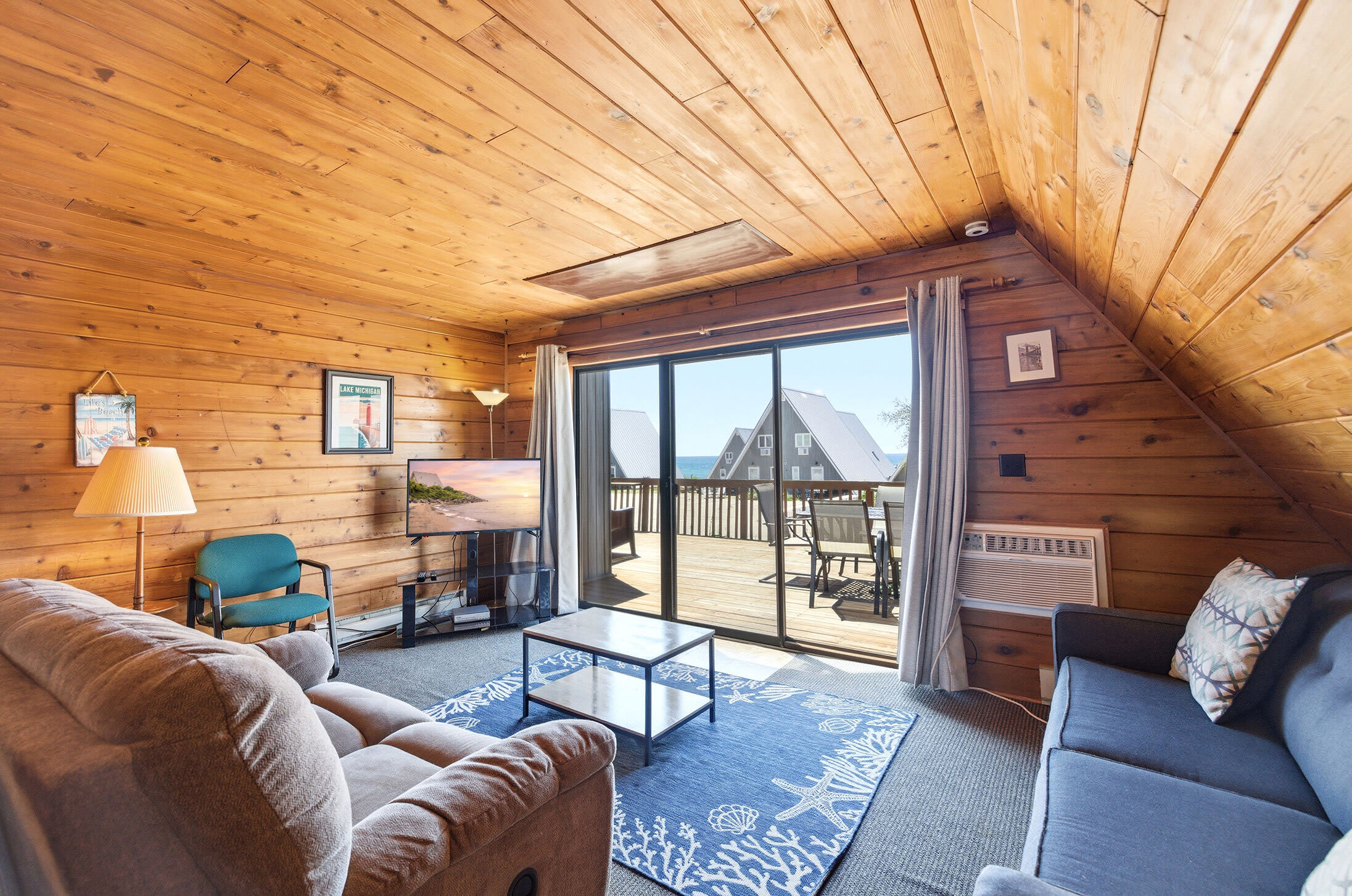 Open living area overlooking Lake Michigan and the resort shoreline.