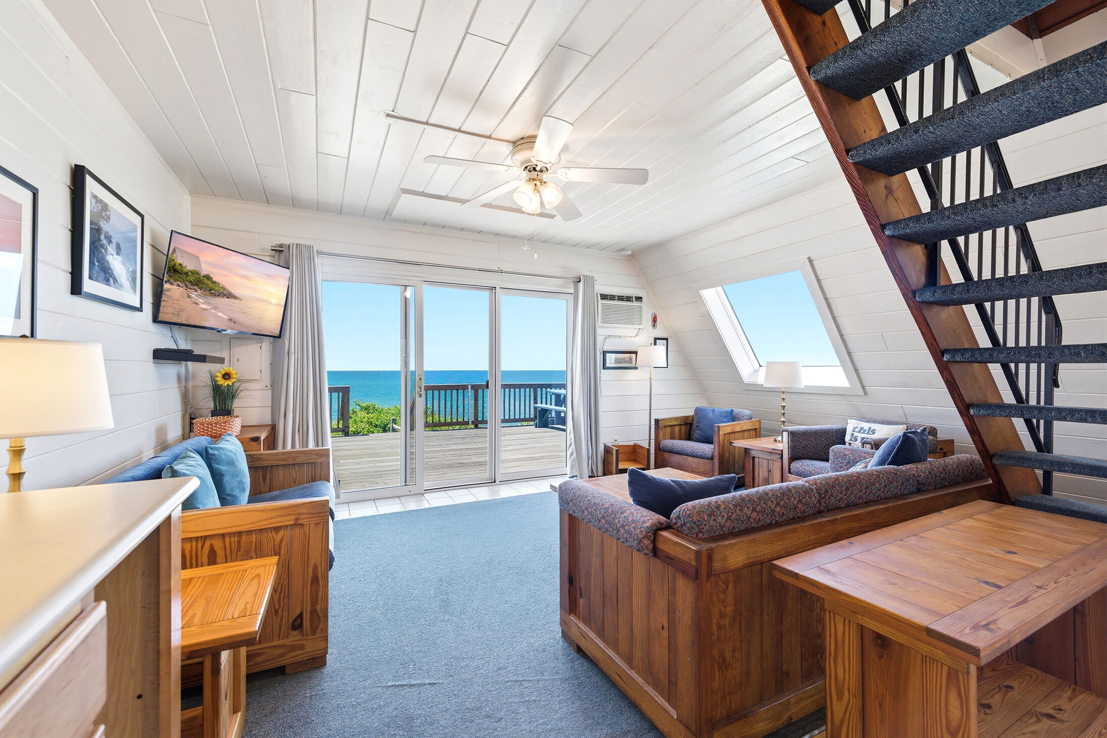 Chalet #20's Lakeside living with direct access to the deck and shoreline views.