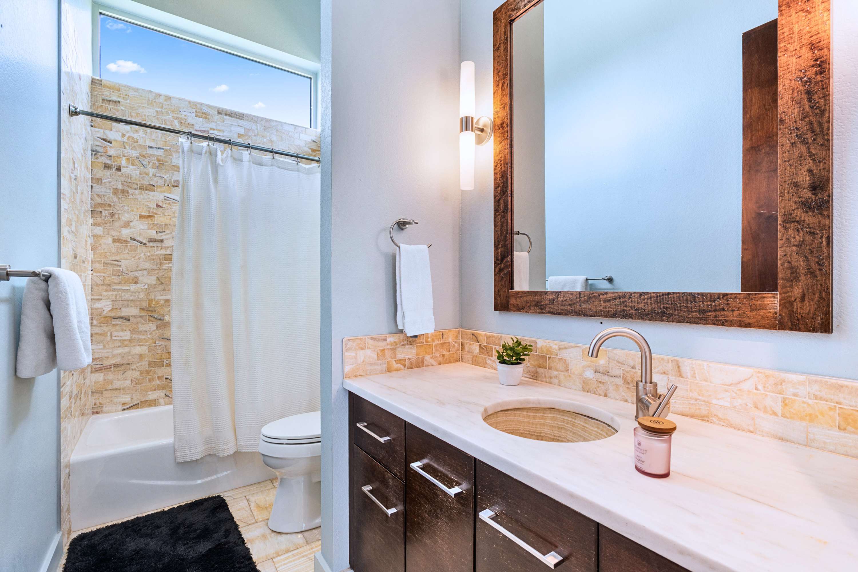 Sleek modern vanity and premium fixtures for a spa-like refresh