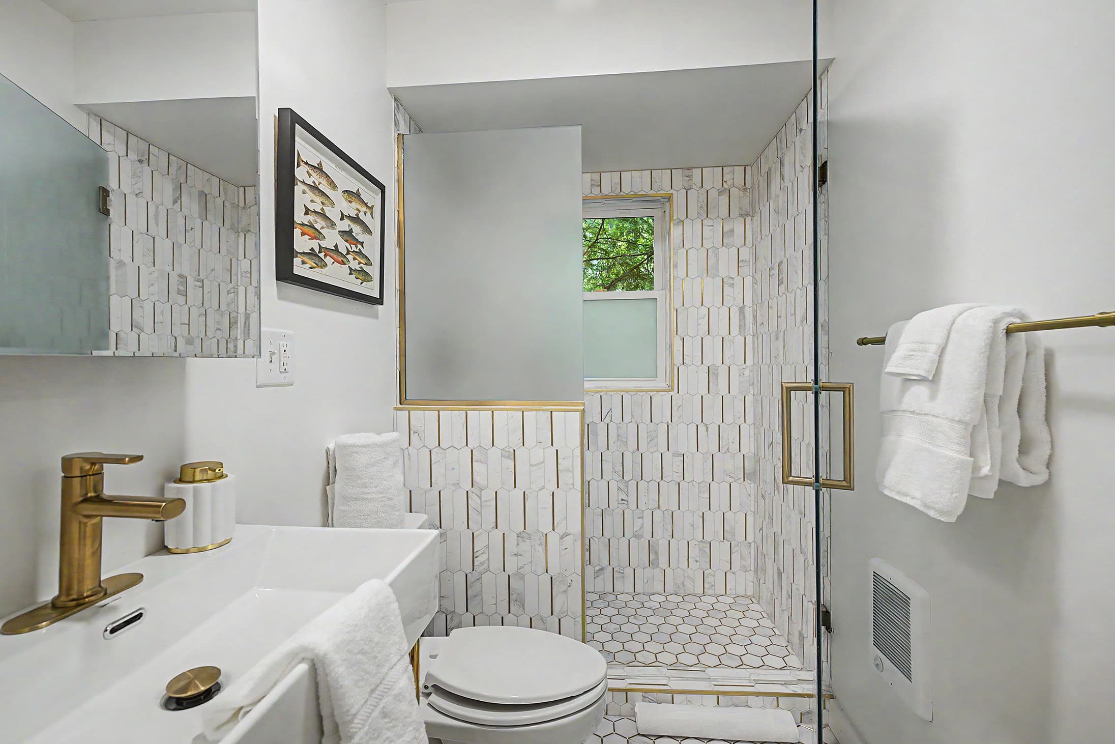 Full bathroom with walk in shower supports comfortable group stays.