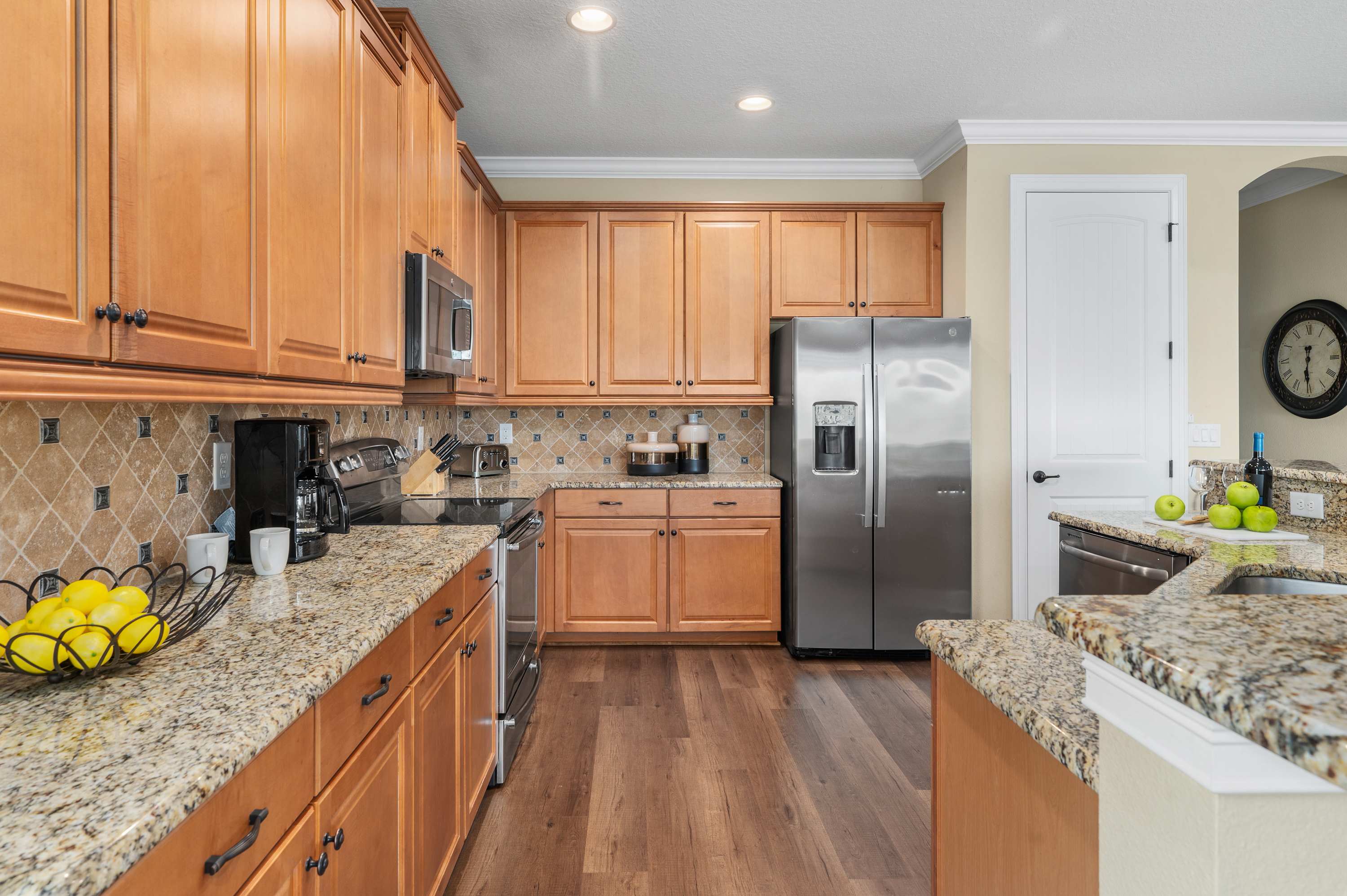 Modern kitchen with granite countertops and stainless steel appliances