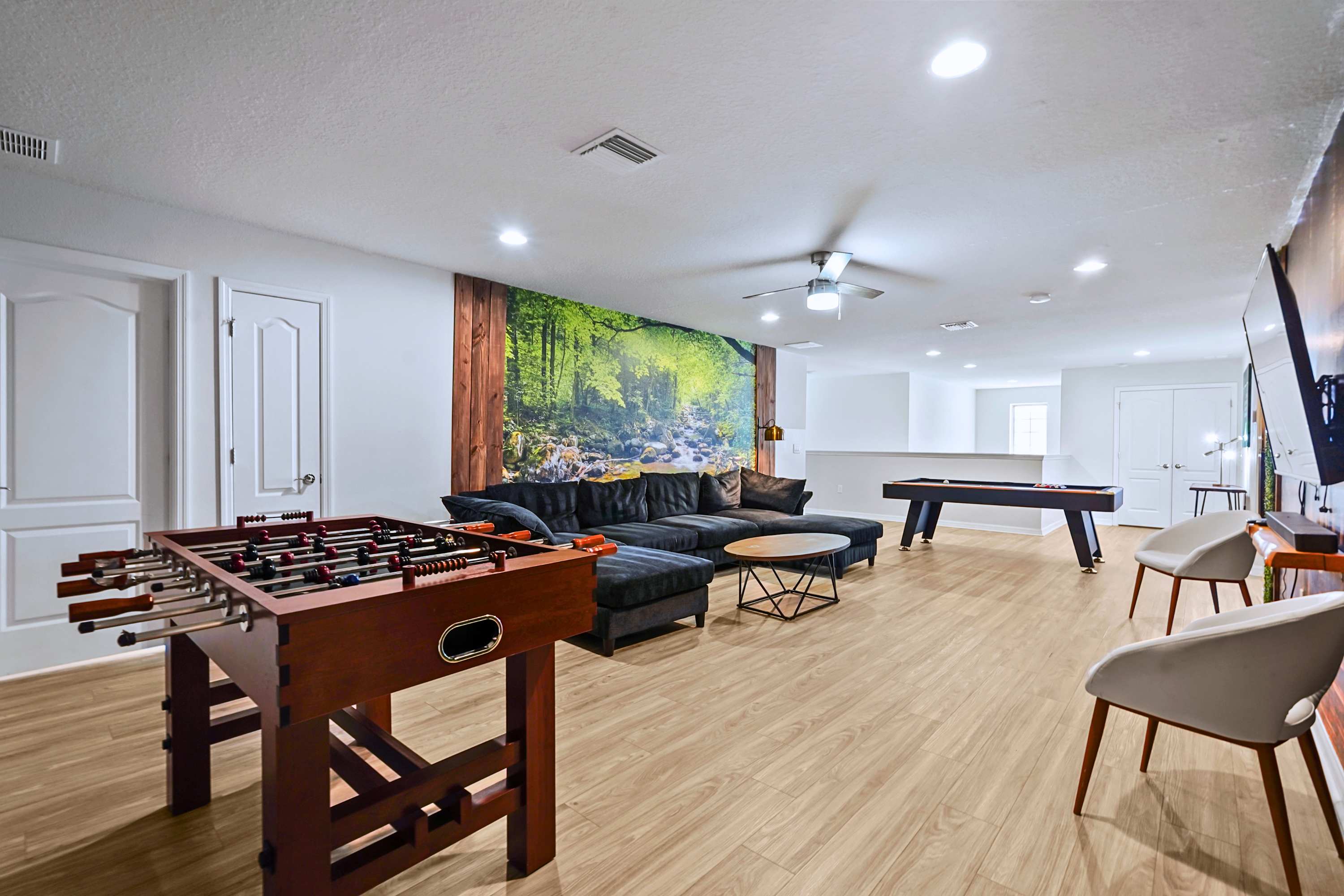 Double the fun! A huge bonus lounge featuring foosball and an extra game table.