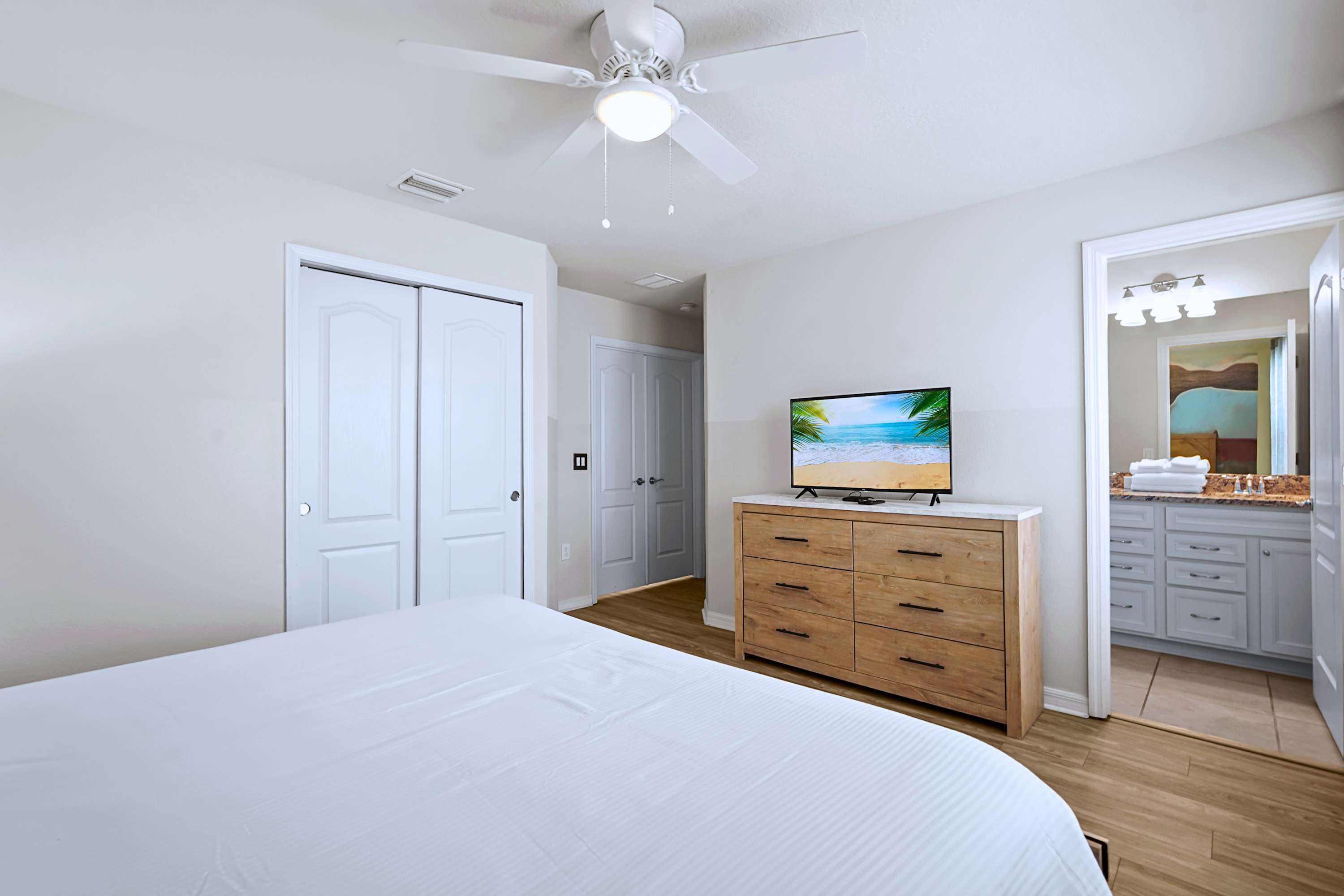 Sleek modern design meets cozy vacation vibes, complete with a private smart streaming TV.