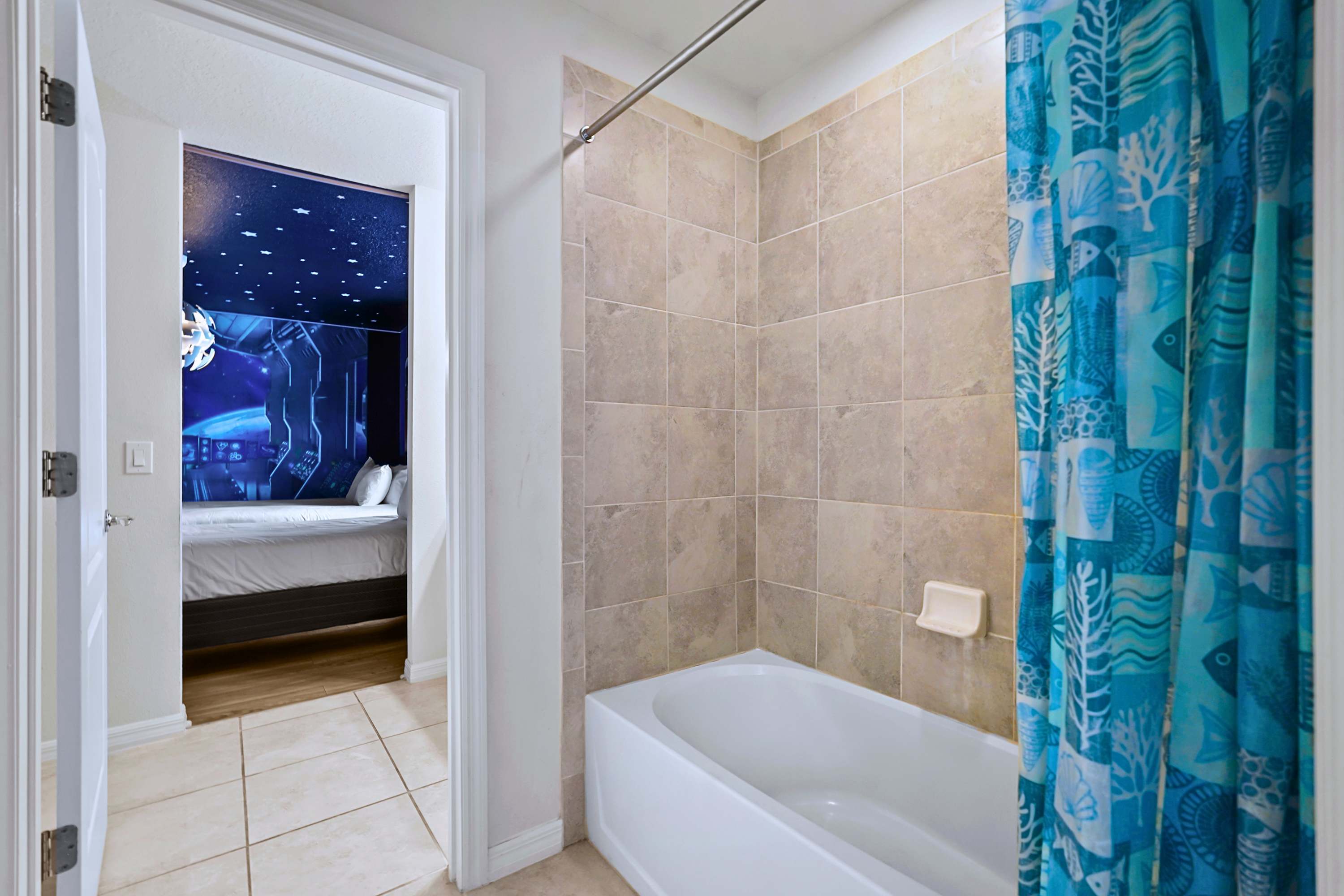 Refresh in a bright, full bath featuring a deep tub and a splash of color.